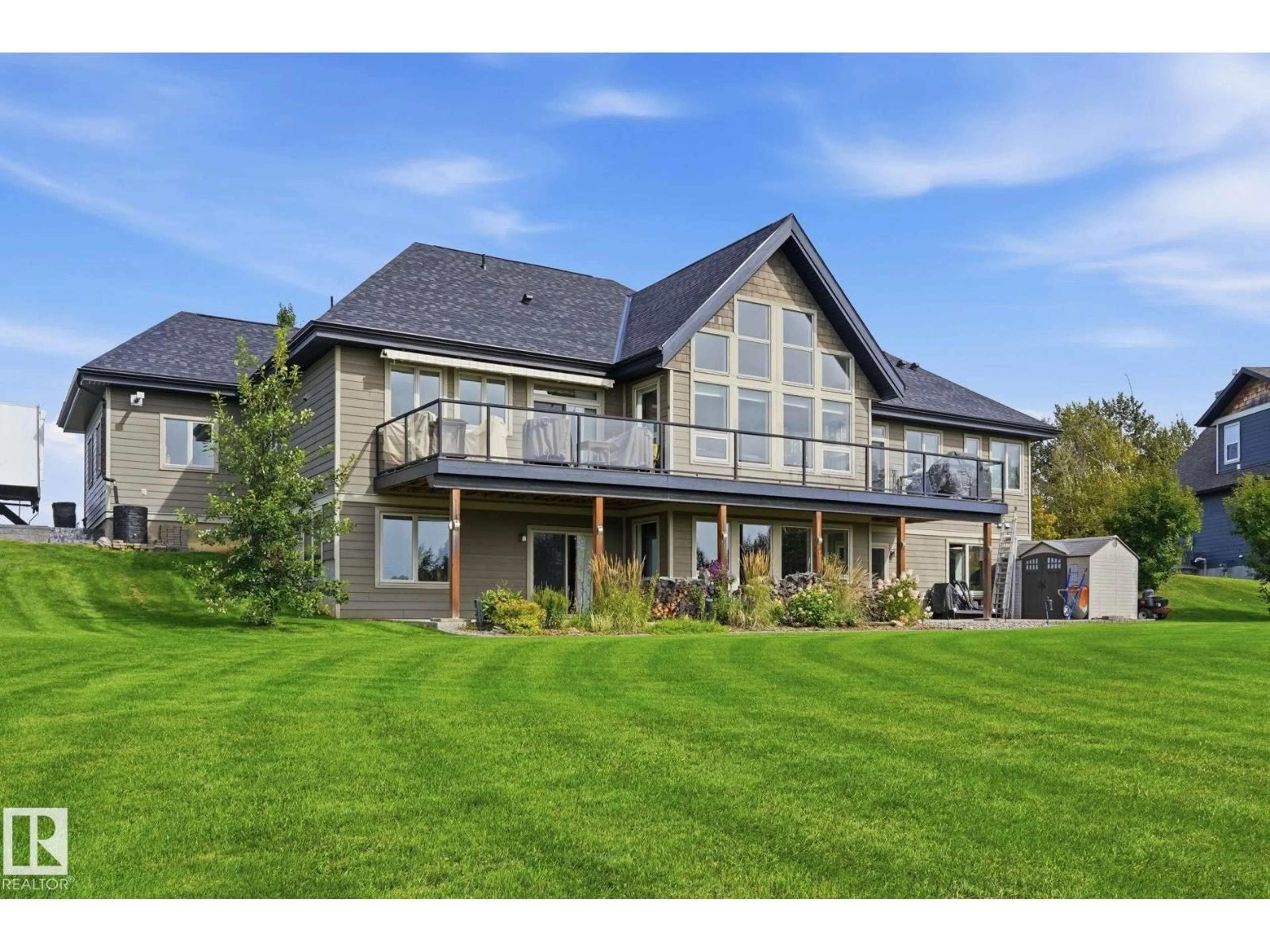 A pic from outside/outdoor area/front of a property/back of a property/a pic from drone, mountain view for 2010 SPRING DR, Rural Parkland County Alberta T7Z1X2