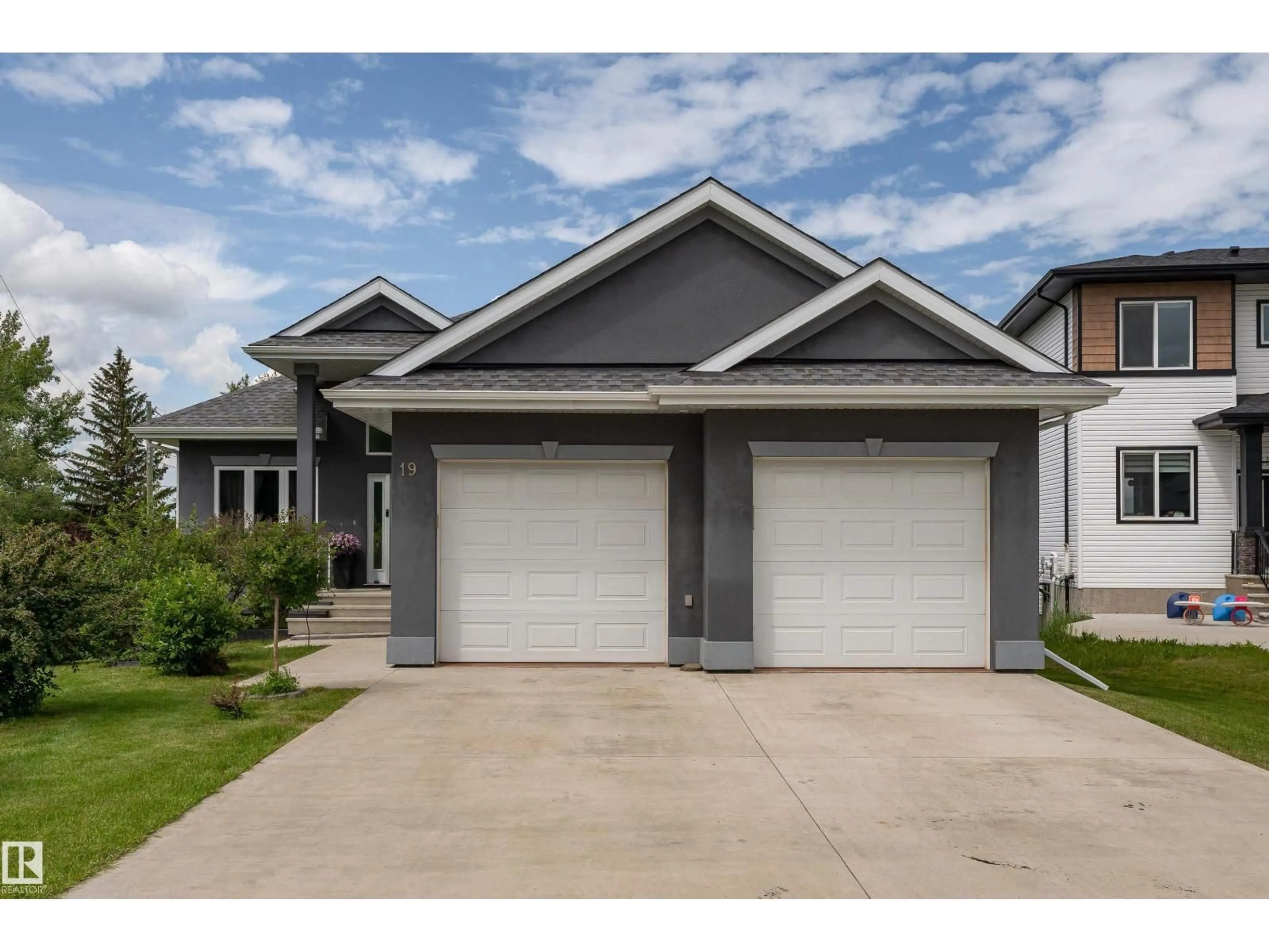 Home with vinyl exterior material, street for 19B SPRUCE MEADOW LANE, Bon Accord Alberta T0A0K0