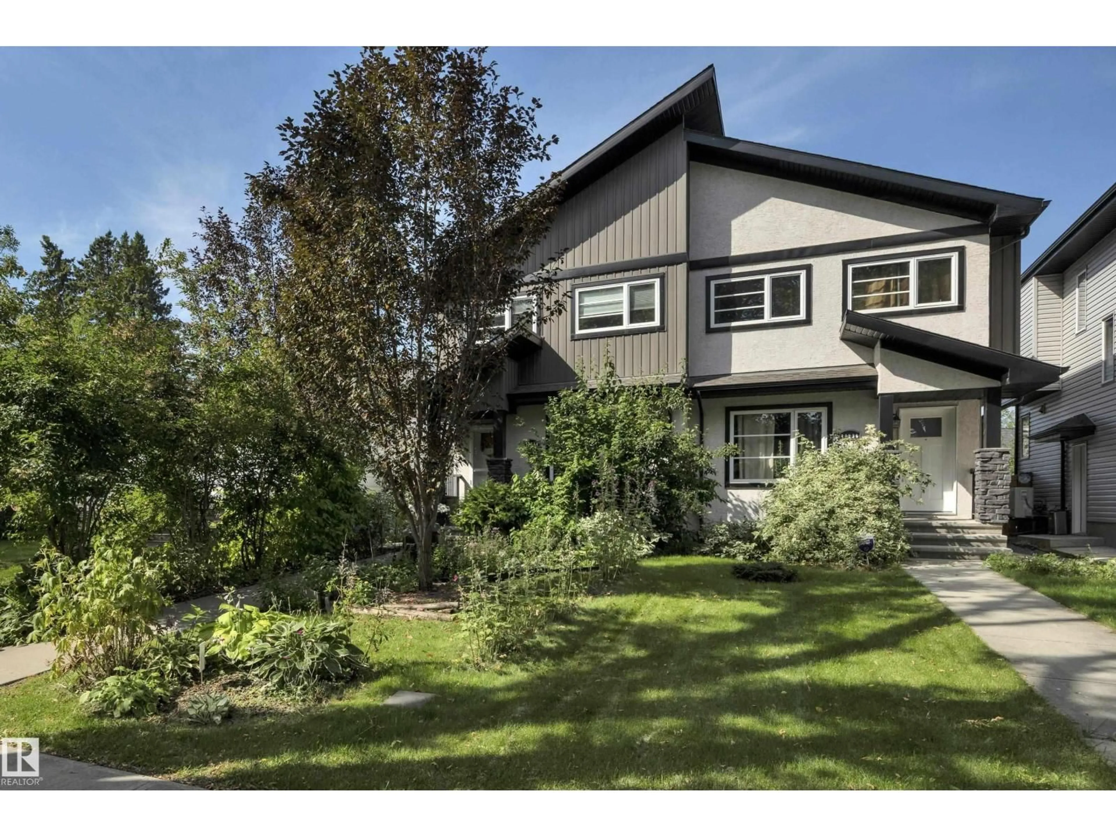 Home with vinyl exterior material, street for 11234 105 ST, Edmonton Alberta T5G2M5