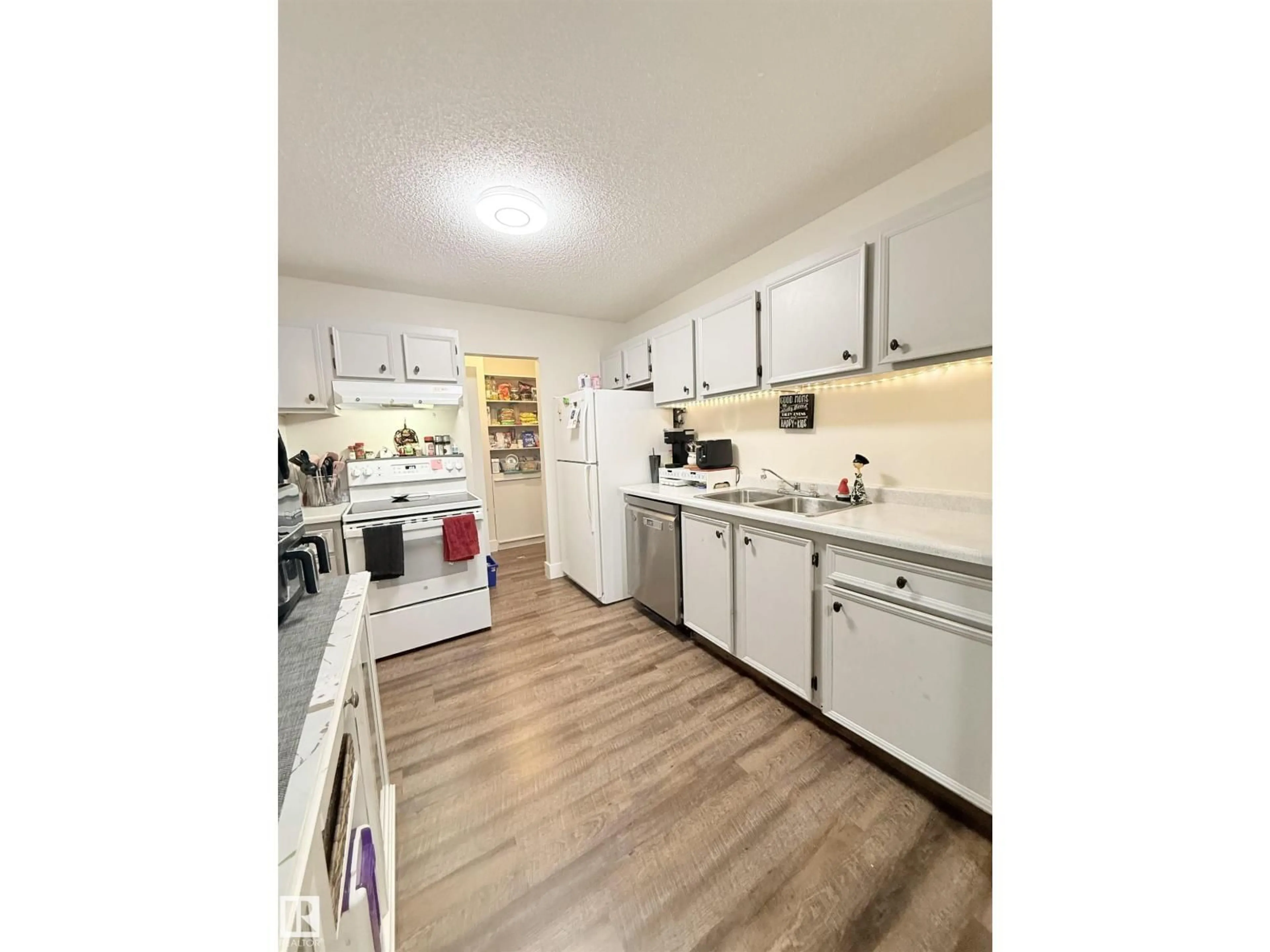 Kitchen with laundary machines, unknown for #89 - 2703 79 ST, Edmonton Alberta T6K3Z6