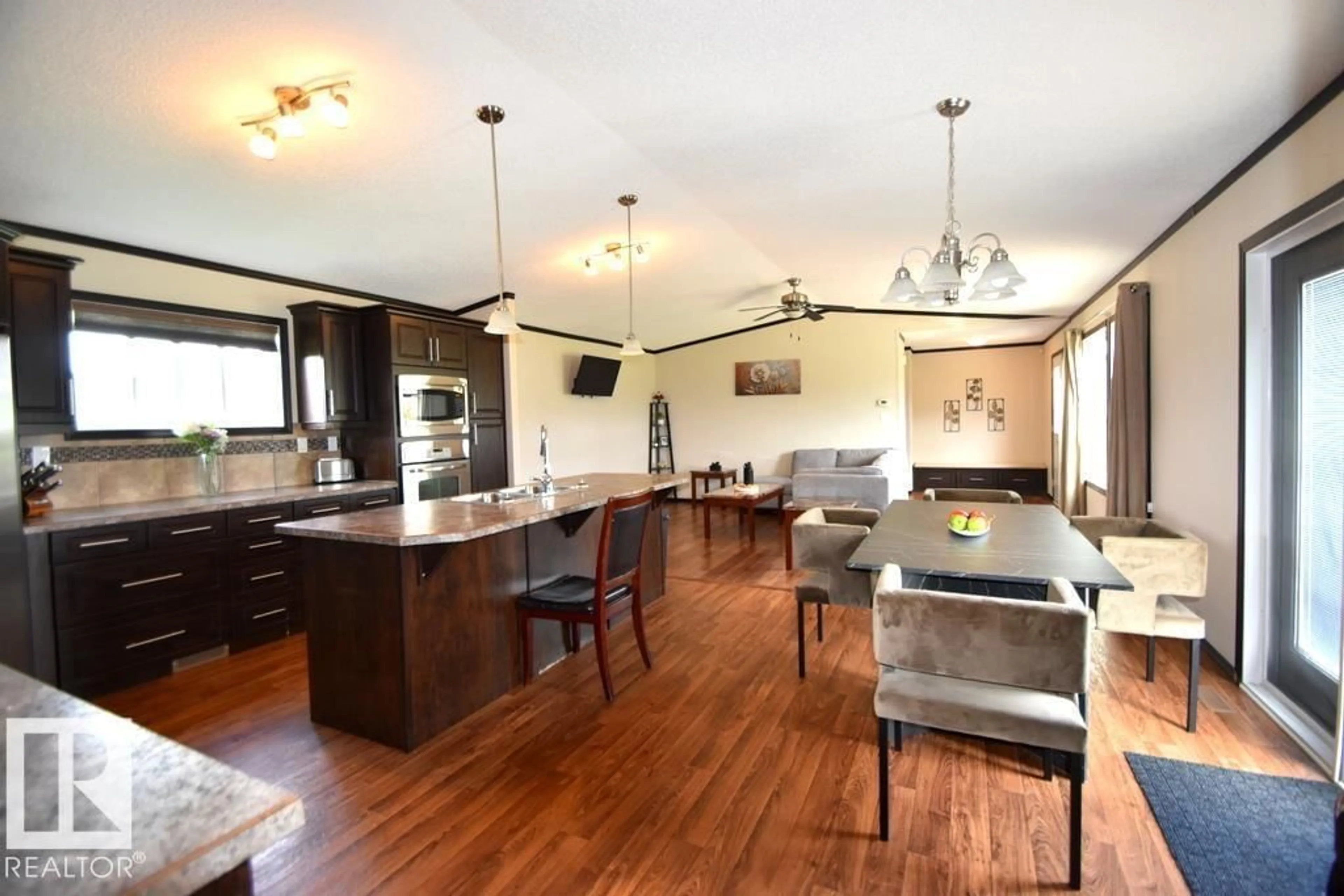 Open concept kitchen, wood/laminate floor for 6540333 - 5 RGE RD 190, Rural Athabasca County Alberta T0A0M0