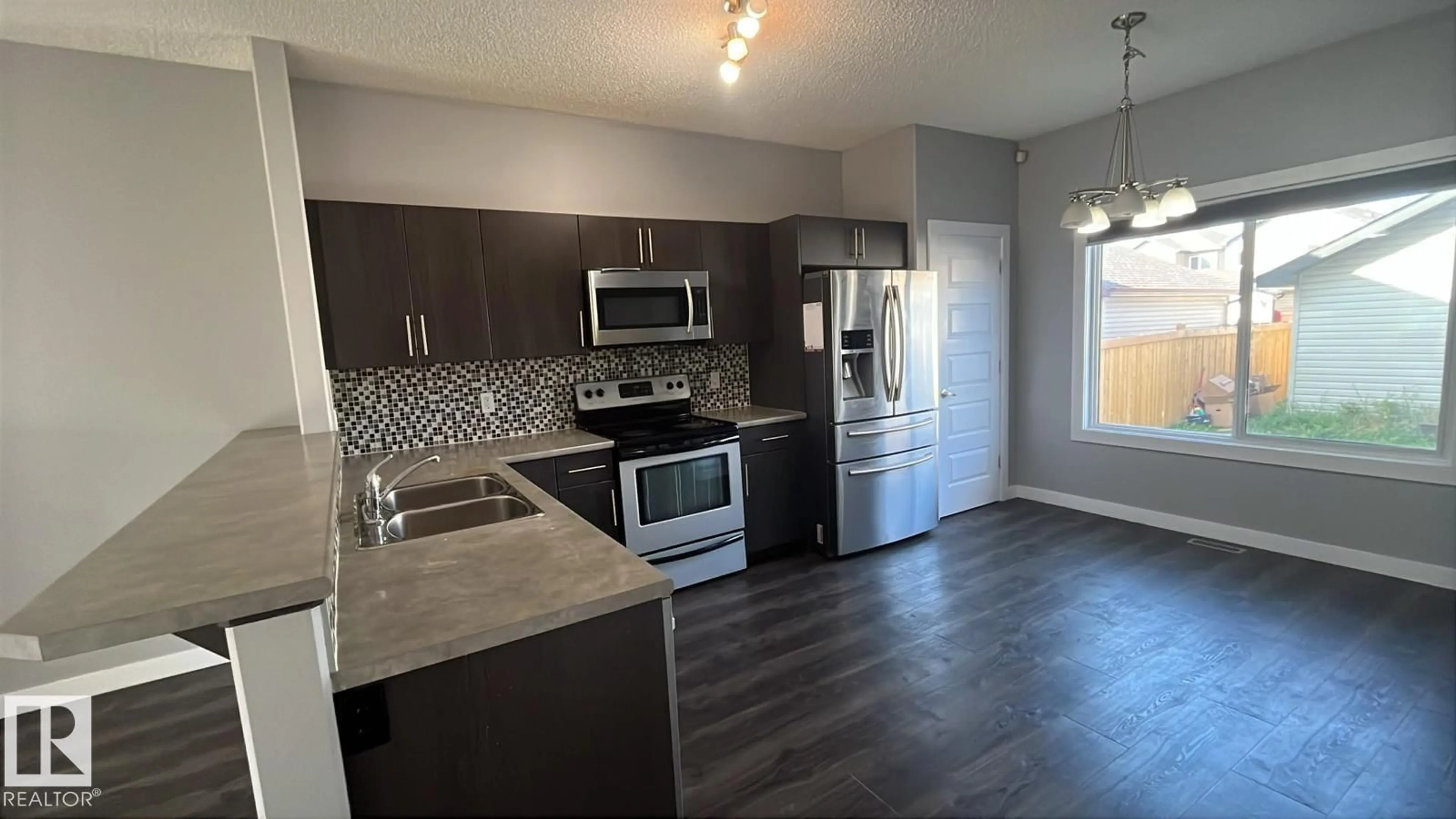 Open concept kitchen, unknown for 1470 33 ST, Edmonton Alberta T6T0V1