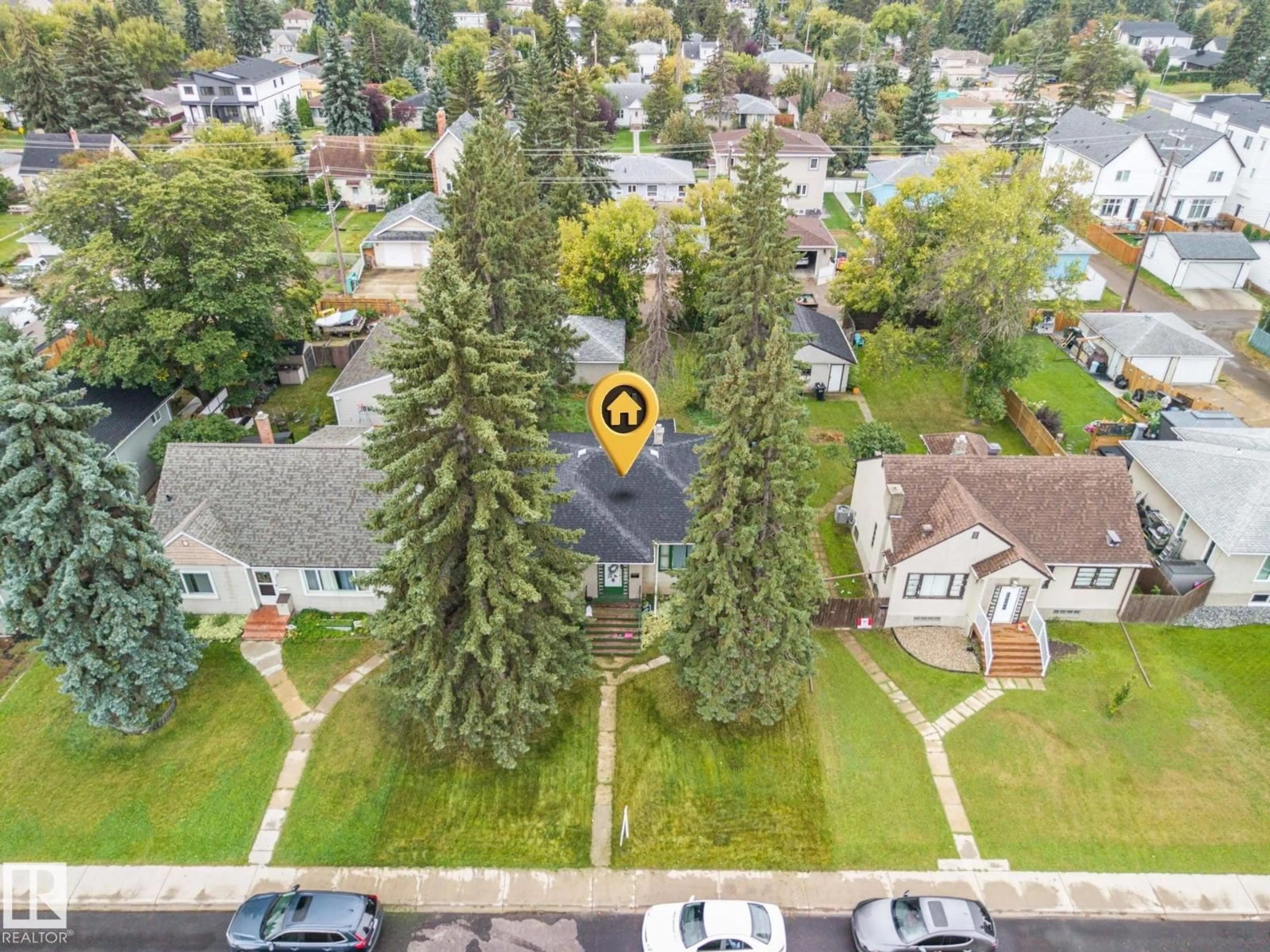 A pic from outside/outdoor area/front of a property/back of a property/a pic from drone, street for 11331 111 AV NW, Edmonton Alberta T5G0C8
