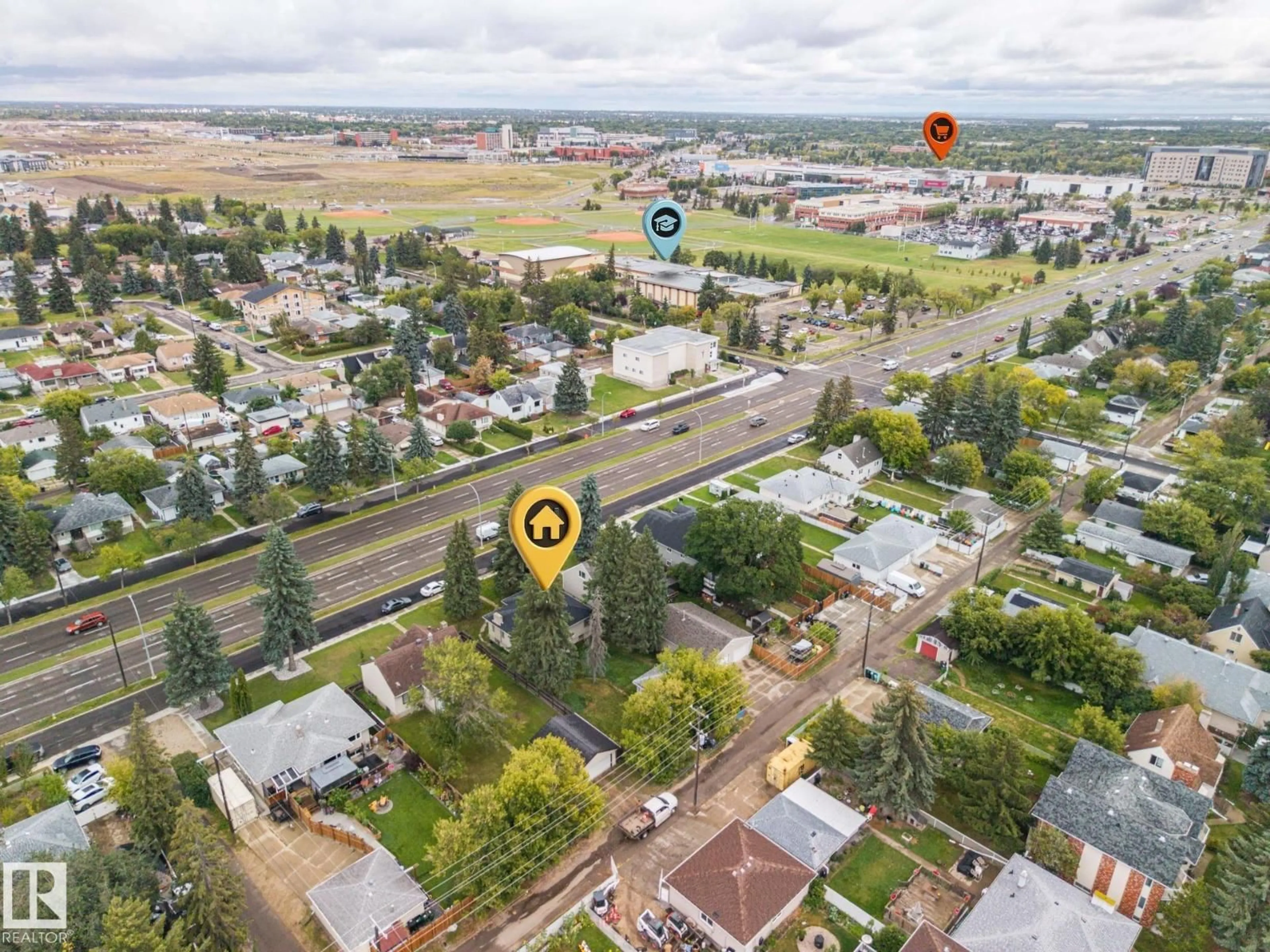 A pic from outside/outdoor area/front of a property/back of a property/a pic from drone, street for 11331 111 AV NW, Edmonton Alberta T5G0C8