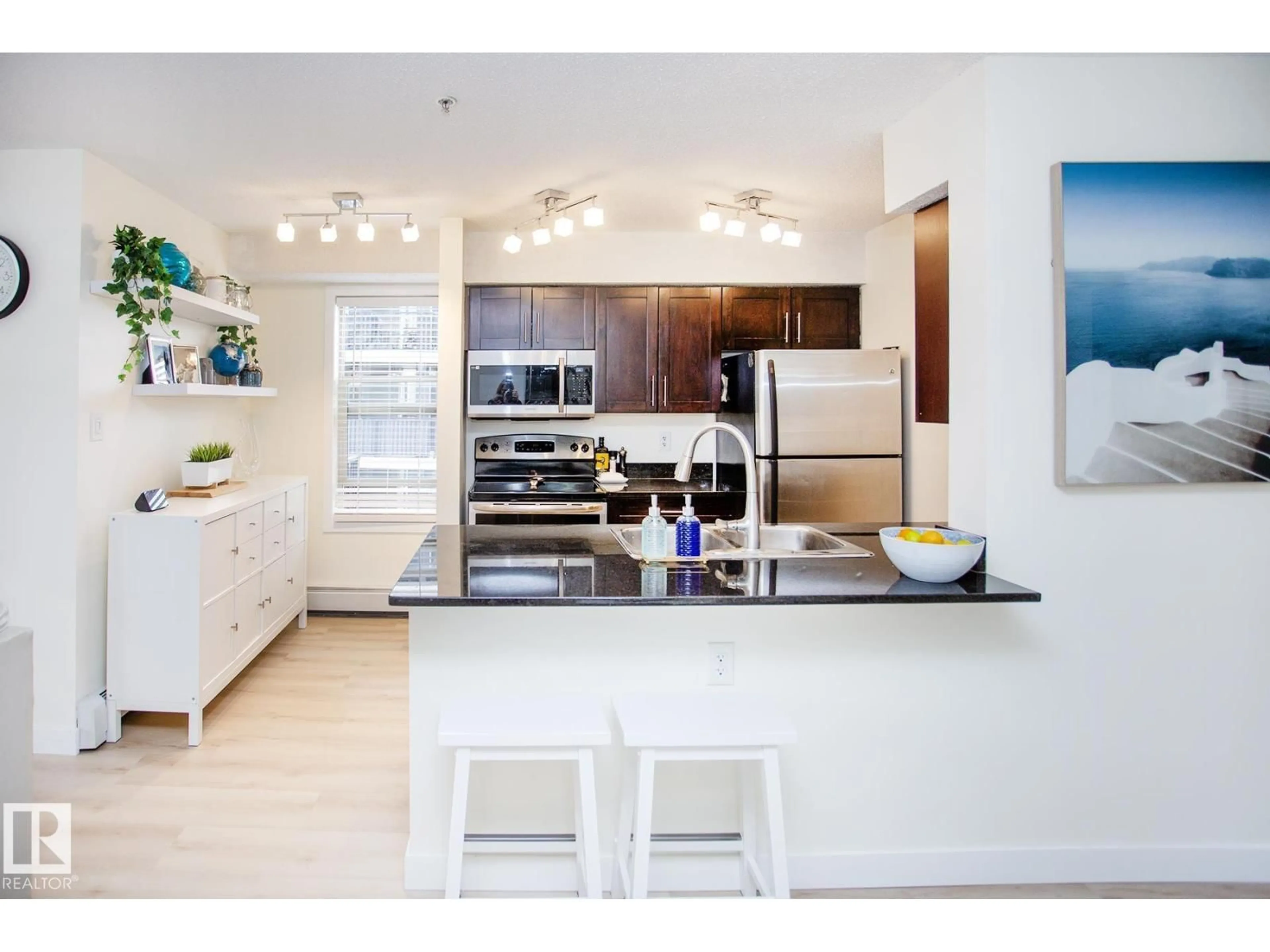 Open concept kitchen, ceramic/tile floor for 201 - 1070 MCCONACHIE BV, Edmonton Alberta T5Y0X1