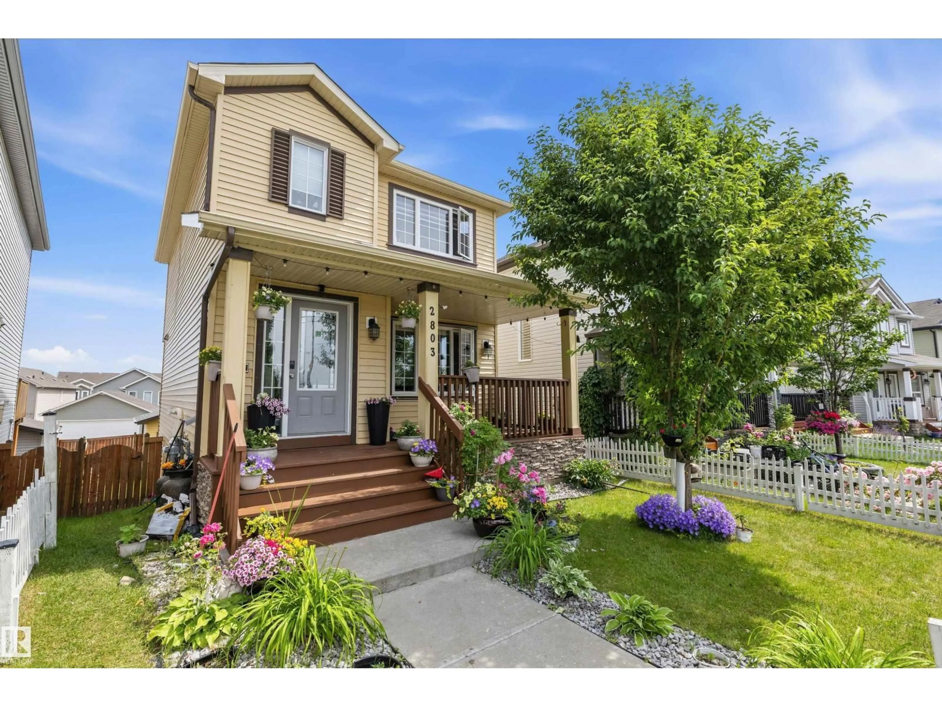 Home with vinyl exterior material, street for 2803 12 ST, Edmonton Alberta T6T0V8