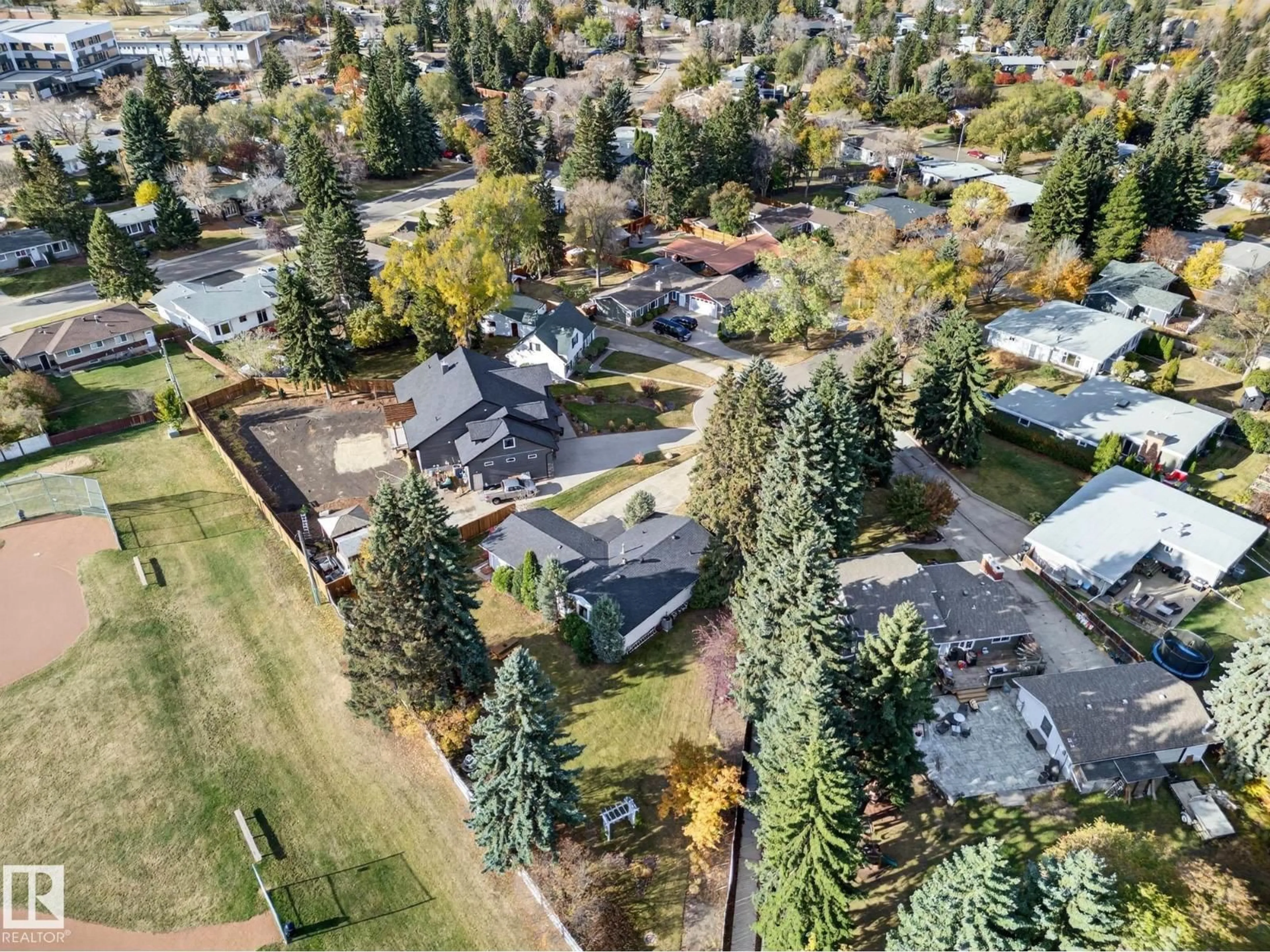 A pic from outside/outdoor area/front of a property/back of a property/a pic from drone, street for NW - 14 ELM CO, Sherwood Park Alberta T8A1J2