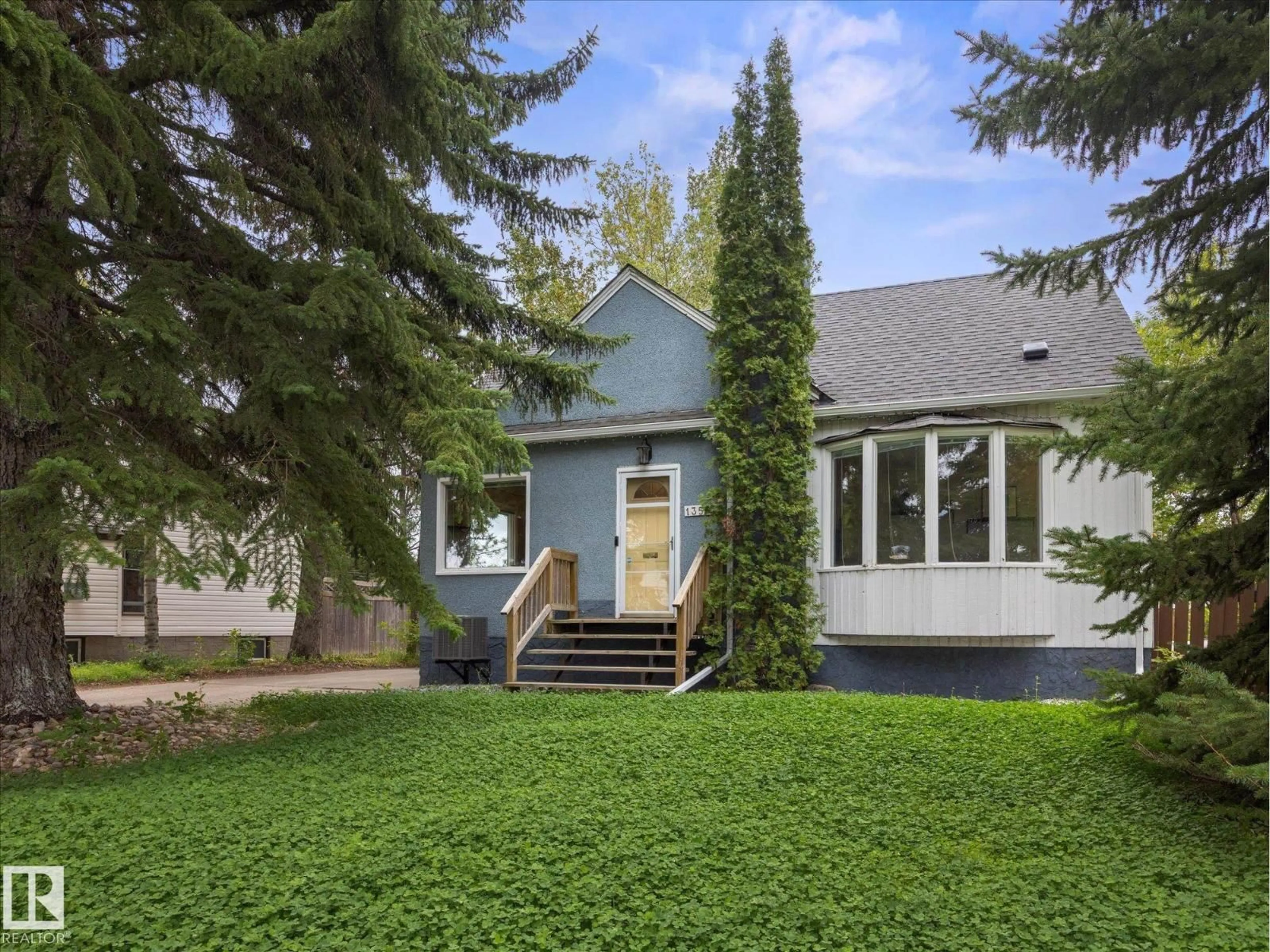 Home with vinyl exterior material, street for 13507 110A AV, Edmonton Alberta T5M2M8