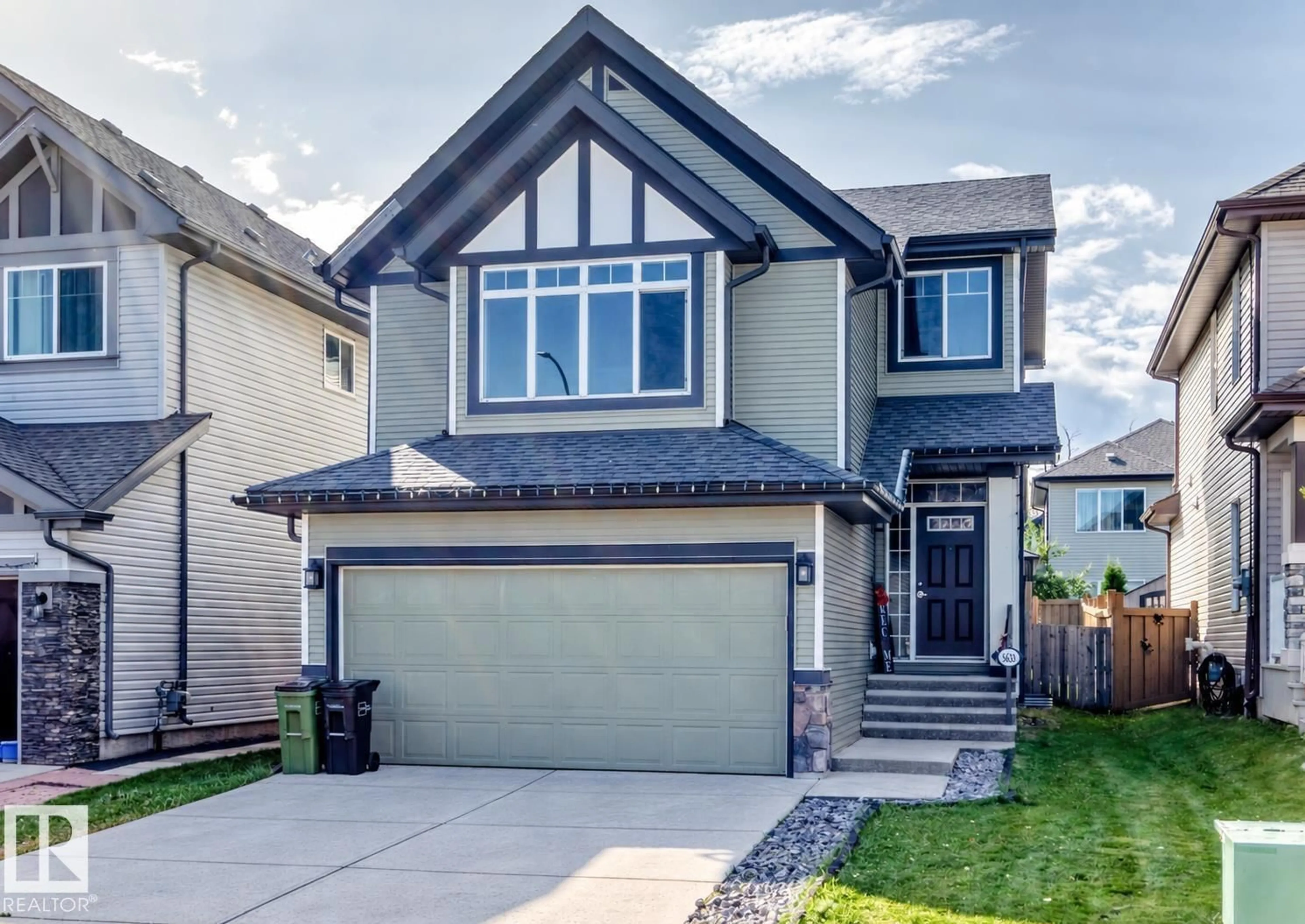 Home with vinyl exterior material, street for 5633 175A AV, Edmonton Alberta T5Y0T7