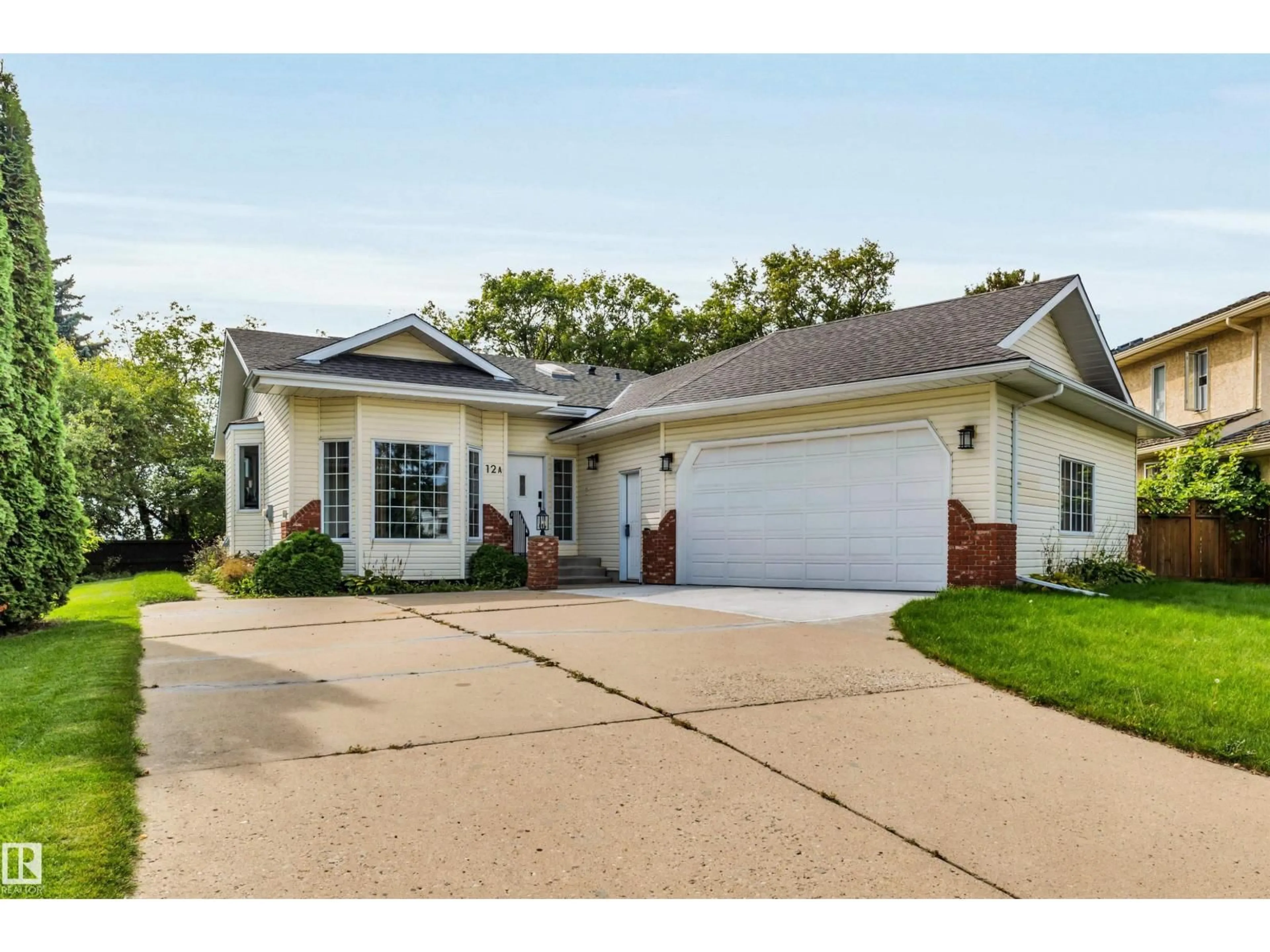 Home with vinyl exterior material, street for A - 12 INVERMERE PL, St. Albert Alberta T8N5N1