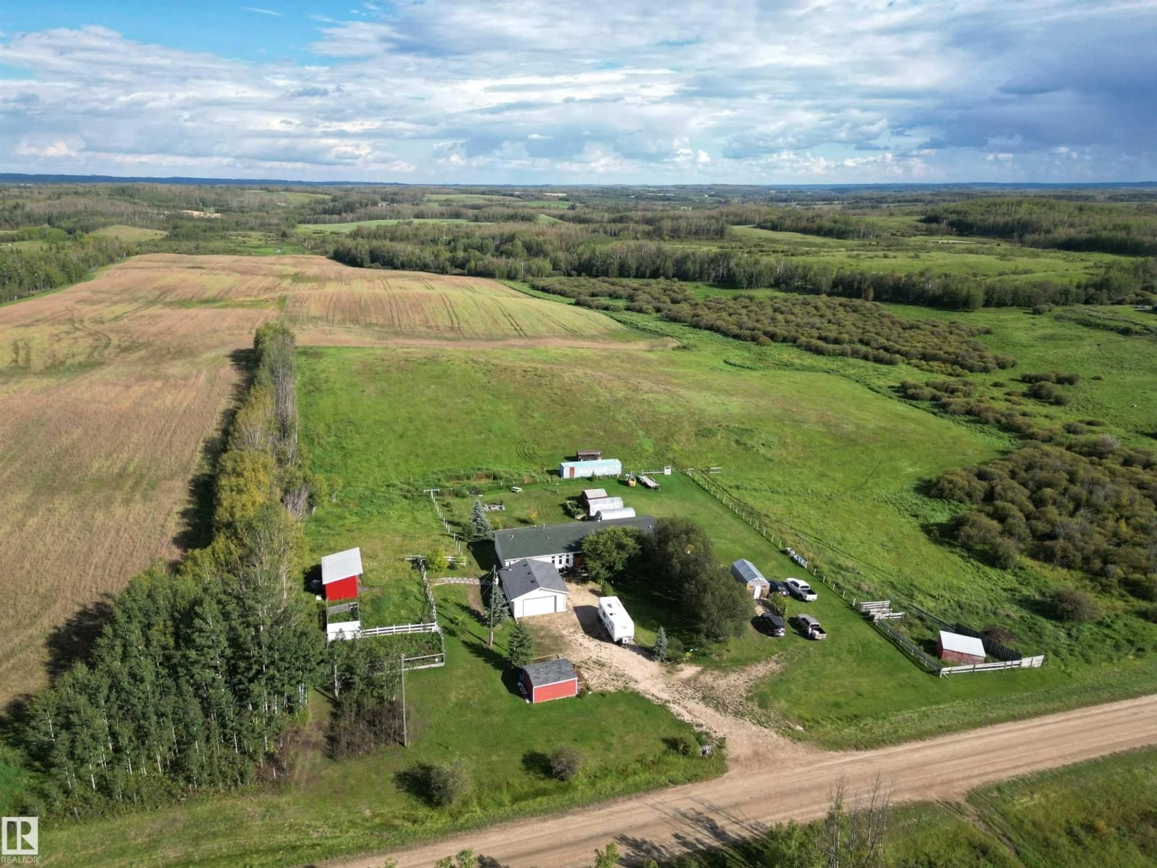 A pic from outside/outdoor area/front of a property/back of a property/a pic from drone, building for 51115 RGE ROAD 60, Rural Parkland County Alberta T0E2H0