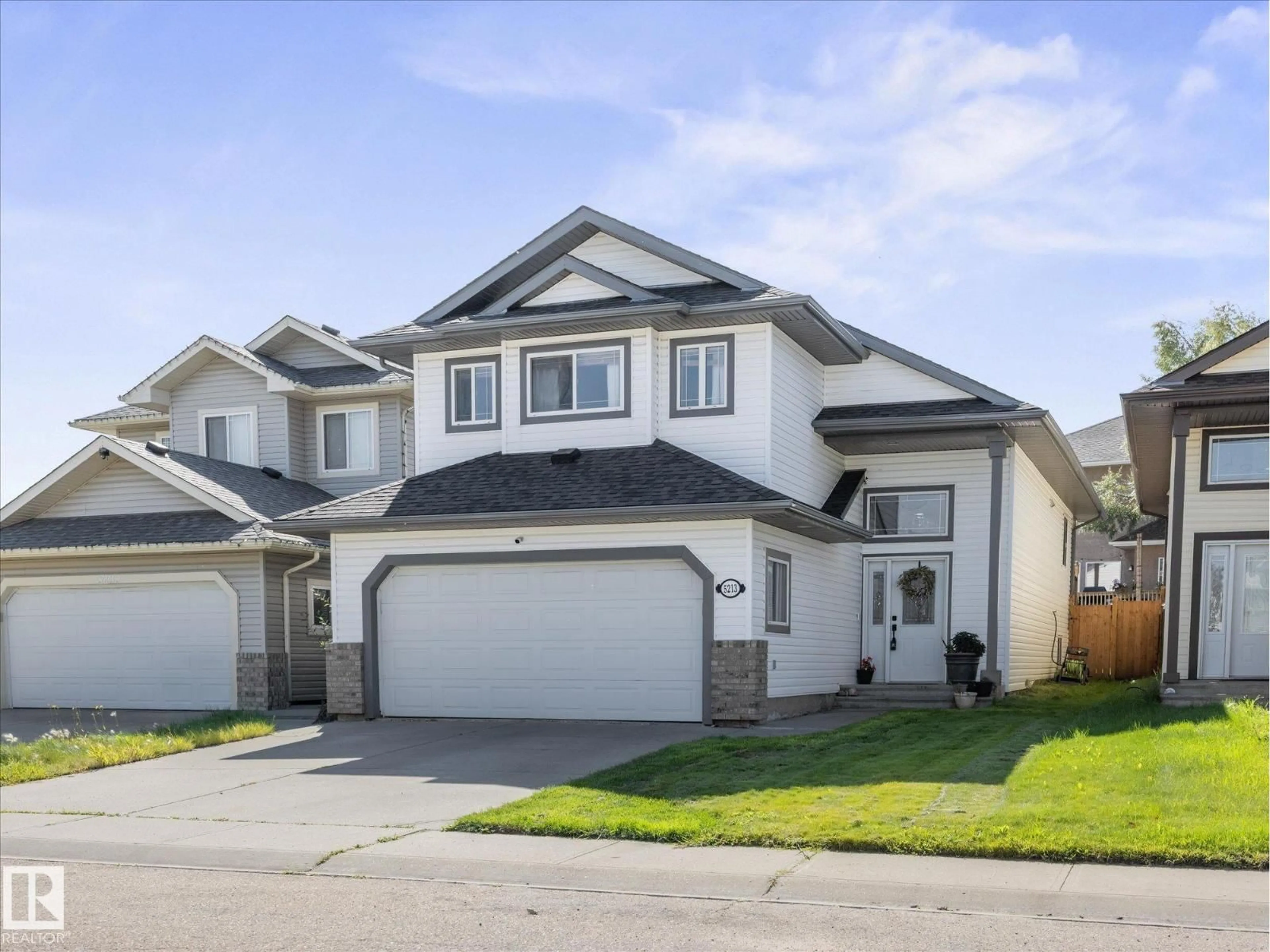 Home with vinyl exterior material, street for 5213 162A AV, Edmonton Alberta T5Y3C8