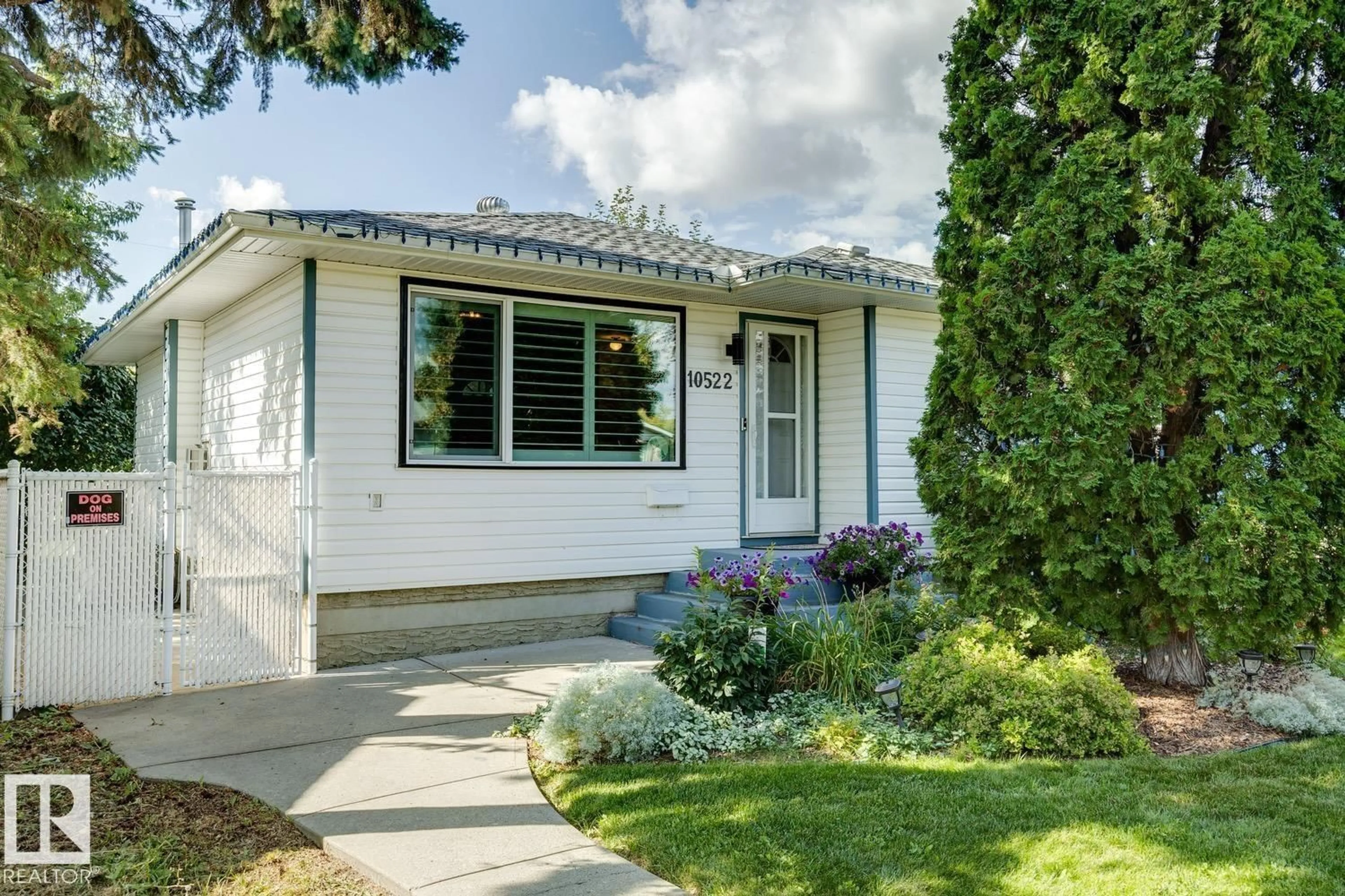 Home with vinyl exterior material, street for NW - 10522 151 ST, Edmonton Alberta T5P1V3