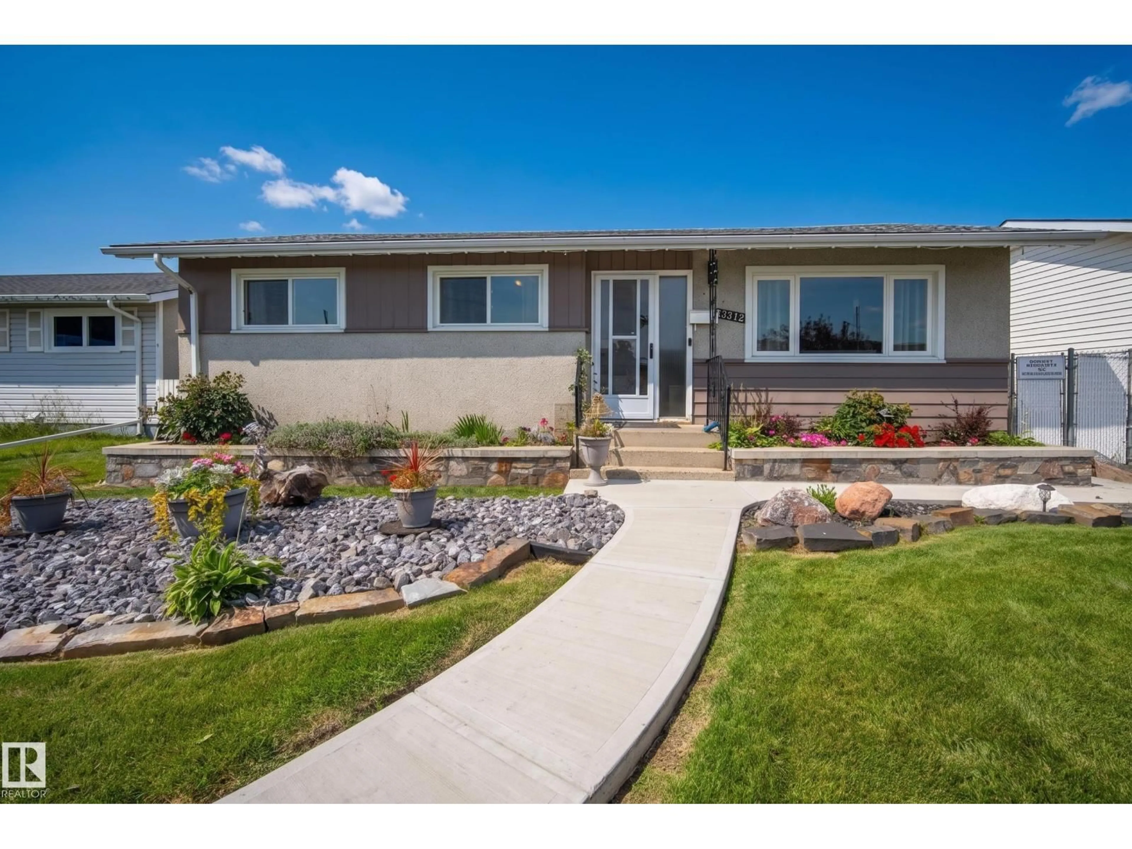 Home with vinyl exterior material, street for 13512 111 ST, Edmonton Alberta T5E4Z8