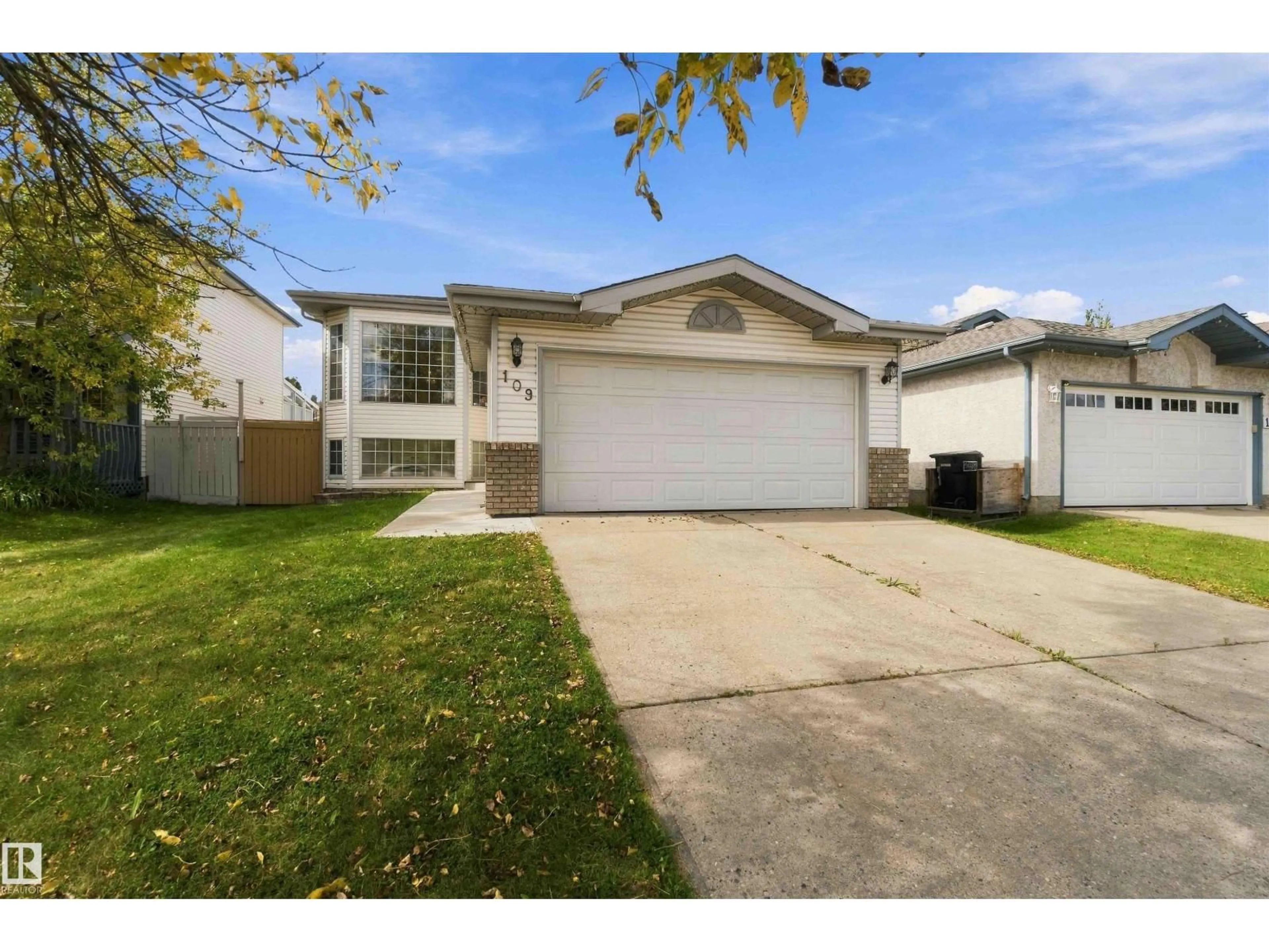 Home with vinyl exterior material, street for 109 JEFFERSON RD, Edmonton Alberta T6L6P8