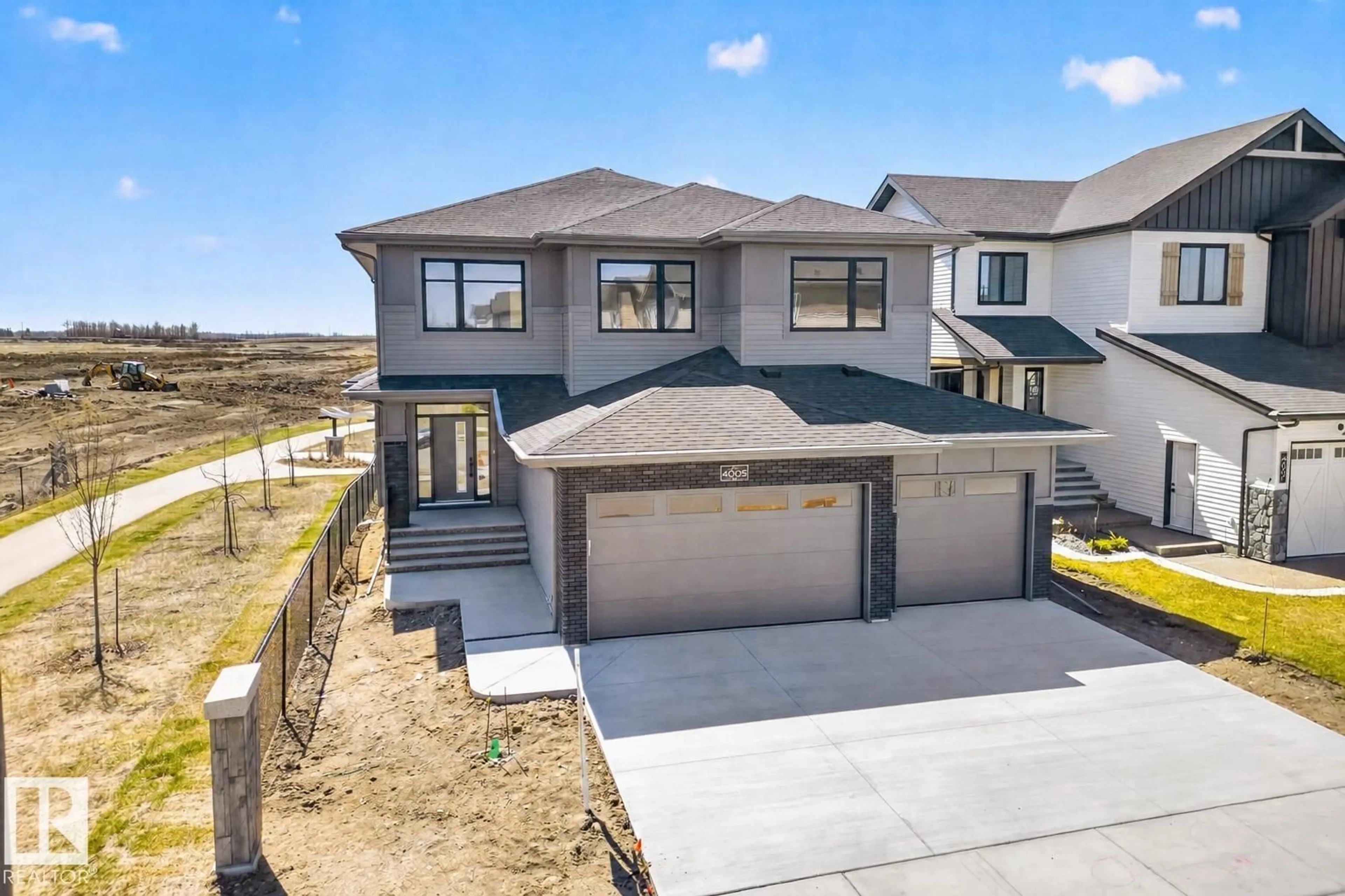 A pic from outside/outdoor area/front of a property/back of a property/a pic from drone, street for 4005 40 AV, Beaumont Alberta T4X3C1