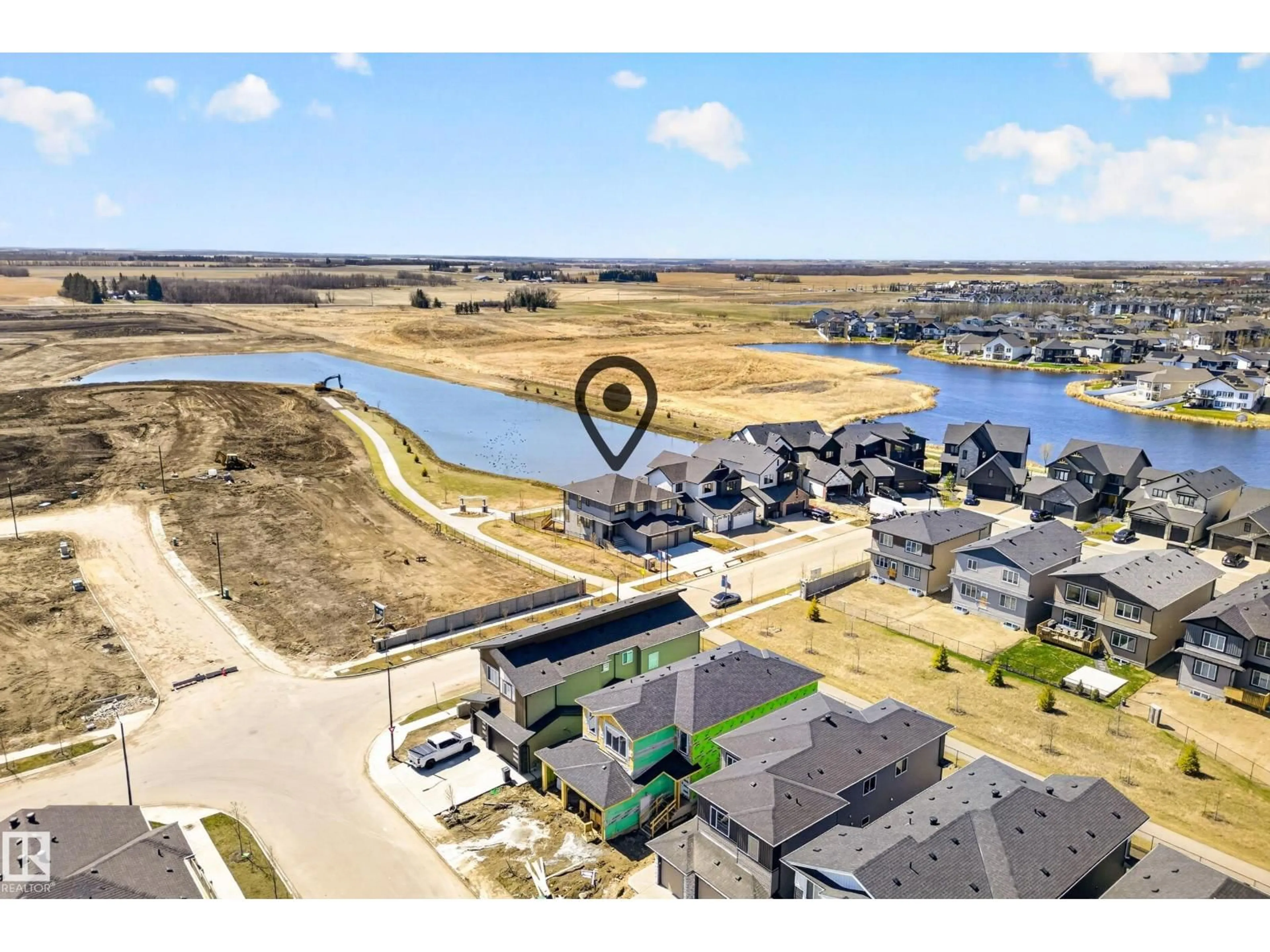A pic from outside/outdoor area/front of a property/back of a property/a pic from drone, water/lake/river/ocean view for 4005 40 AV, Beaumont Alberta T4X3C1
