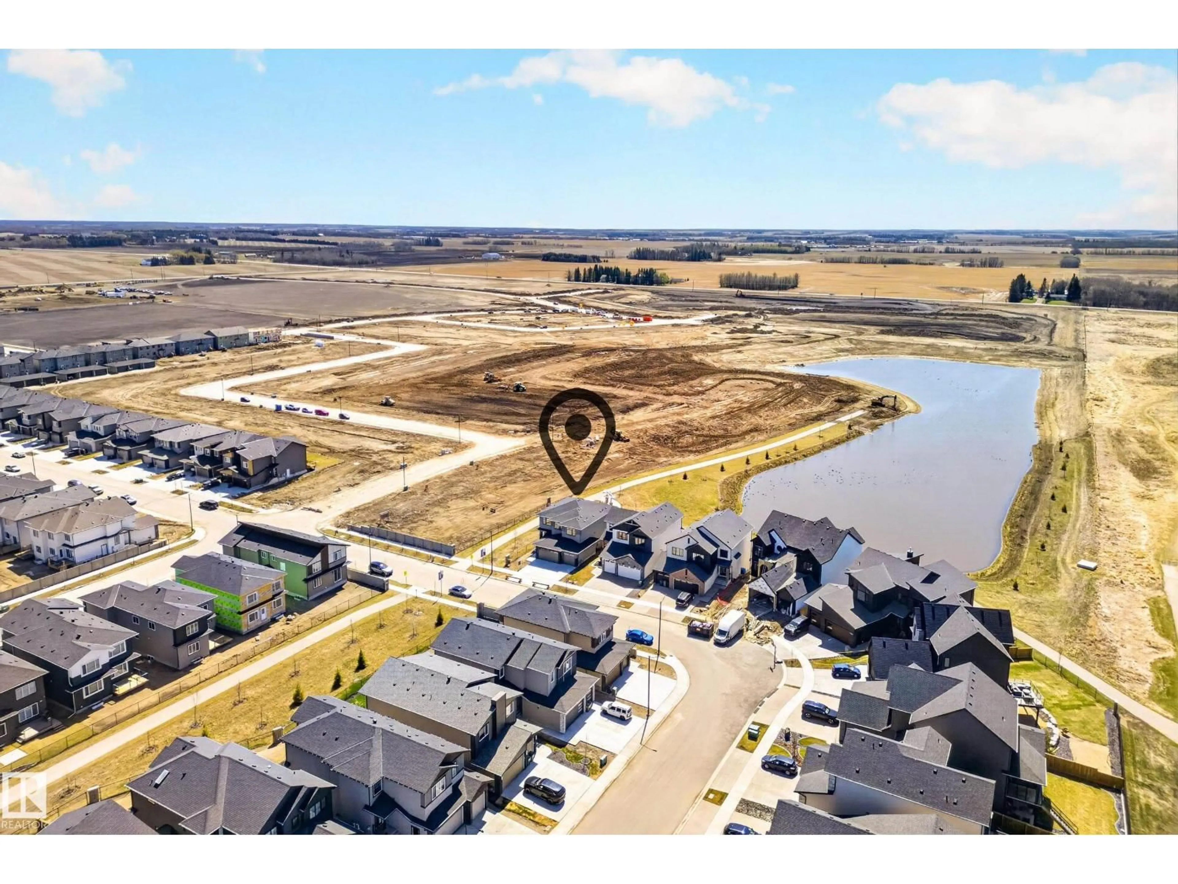 A pic from outside/outdoor area/front of a property/back of a property/a pic from drone, water/lake/river/ocean view for 4005 40 AV, Beaumont Alberta T4X3C1