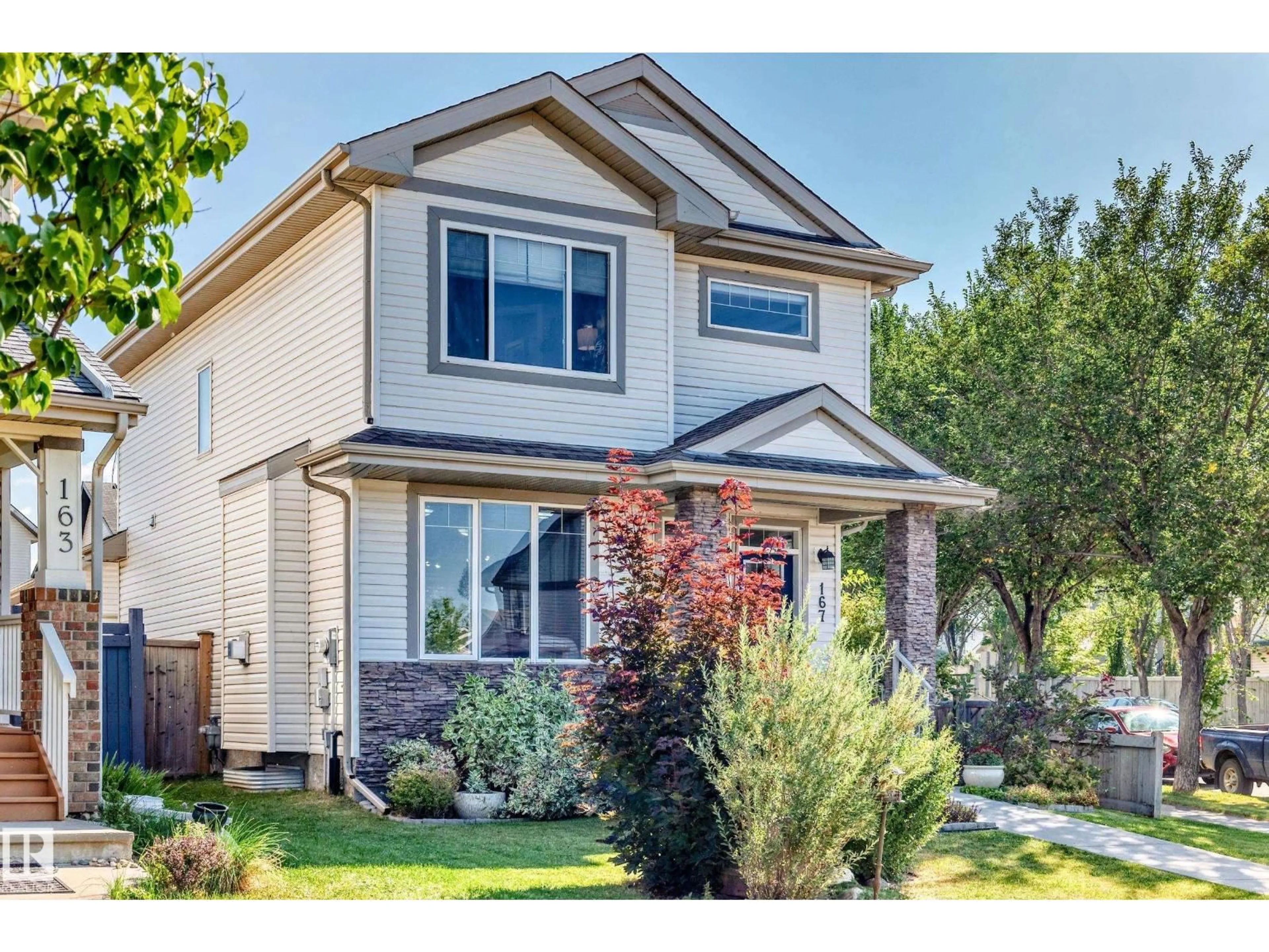 Home with vinyl exterior material, street for SW - 167 63 ST, Edmonton Alberta T6X0B8