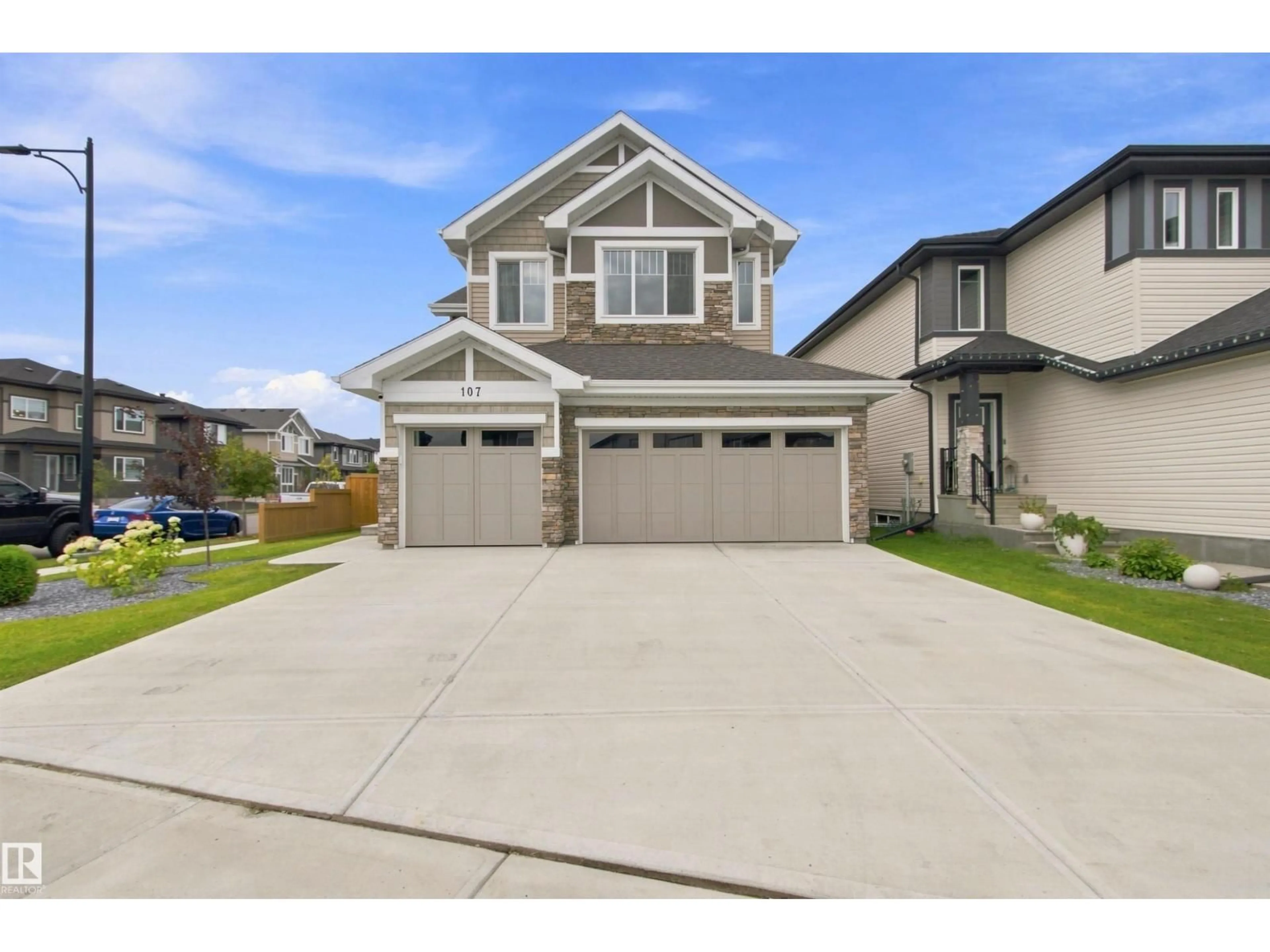 Home with vinyl exterior material, street for 107 ELLICE BN, Fort Saskatchewan Alberta T8L0V2