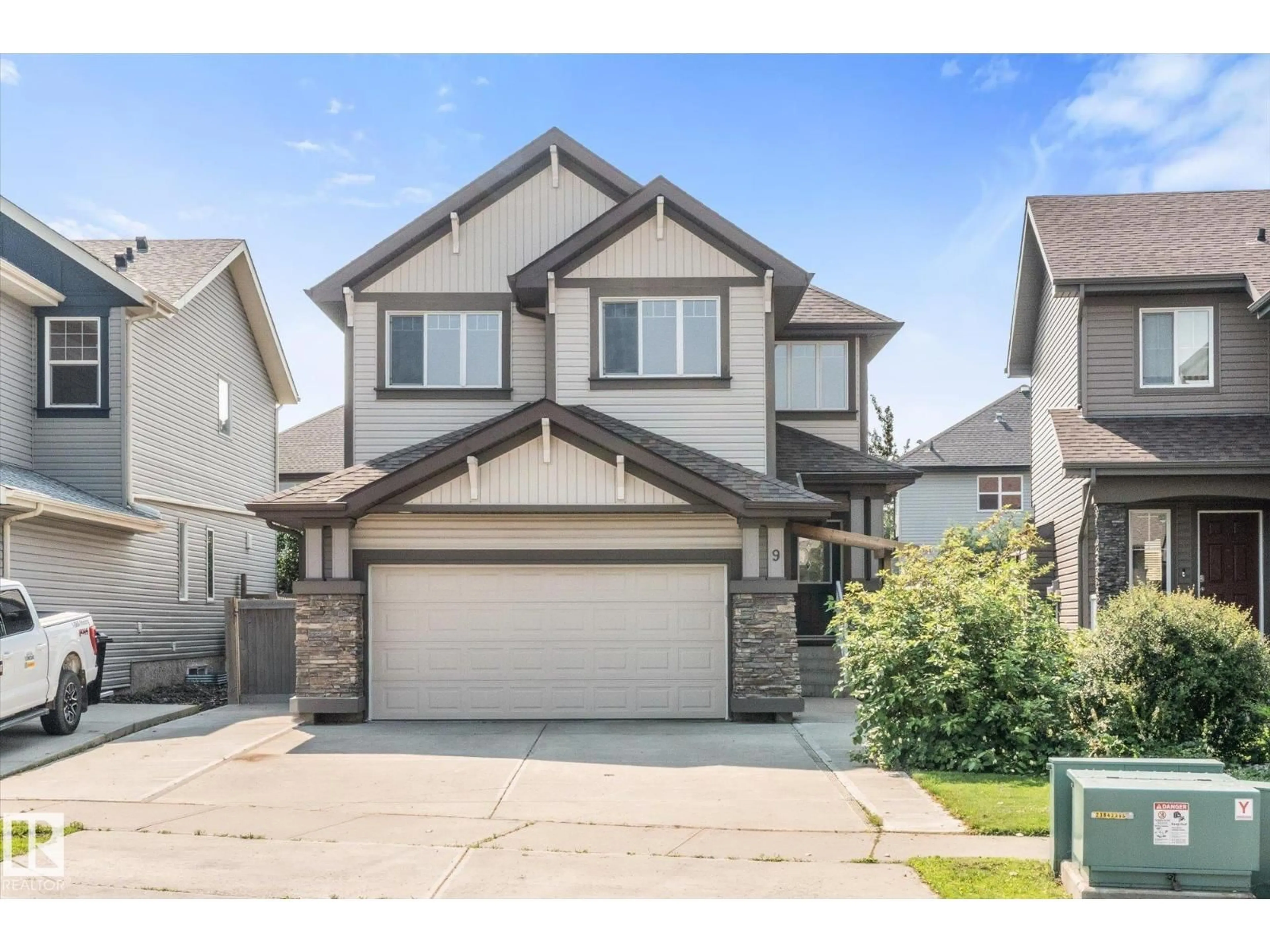 Home with vinyl exterior material, street for 9 BECKER CR, Fort Saskatchewan Alberta T8L0C1