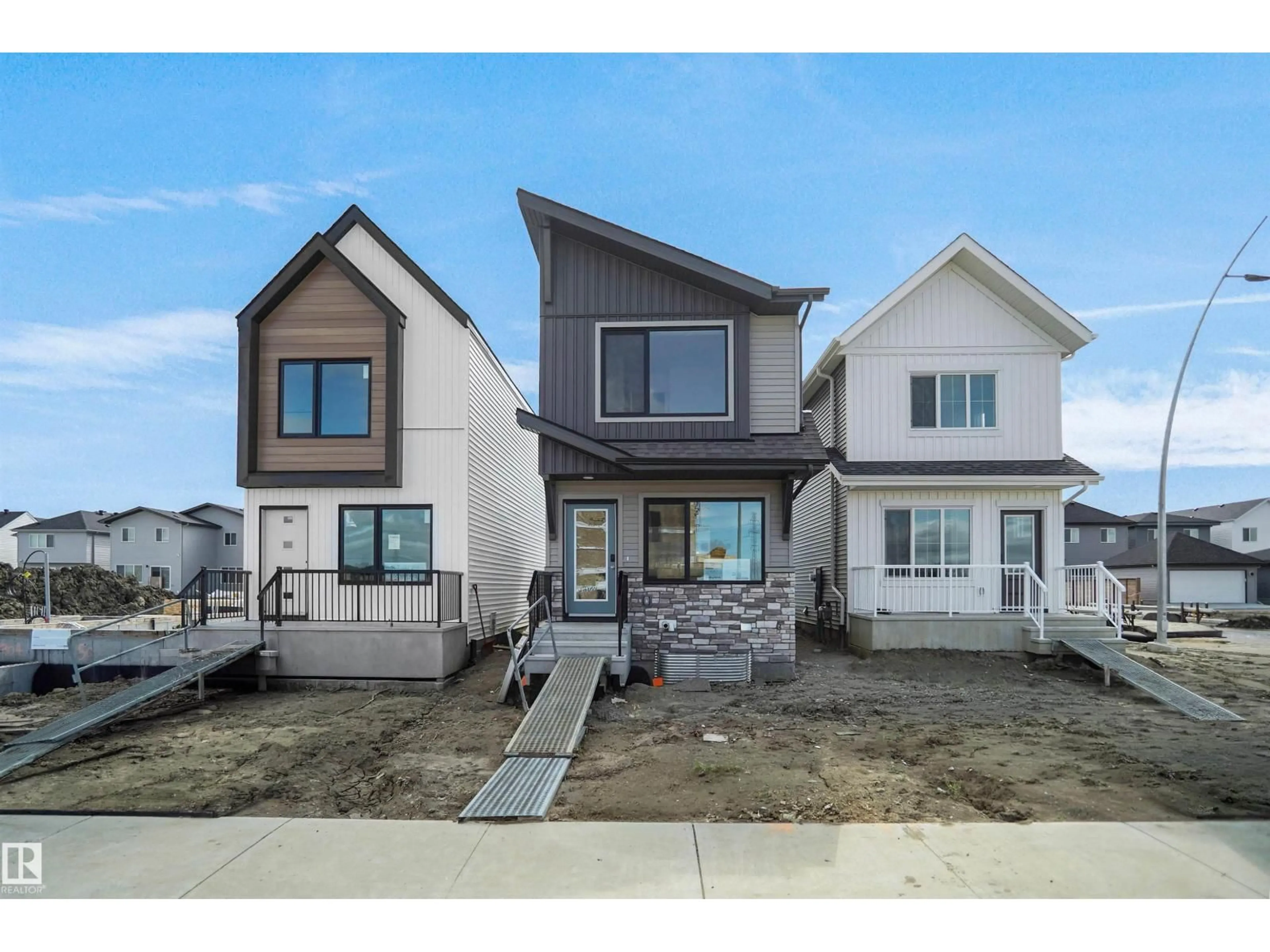Home with vinyl exterior material, street for NE - 505 177 AV, Edmonton Alberta T5Y4K2