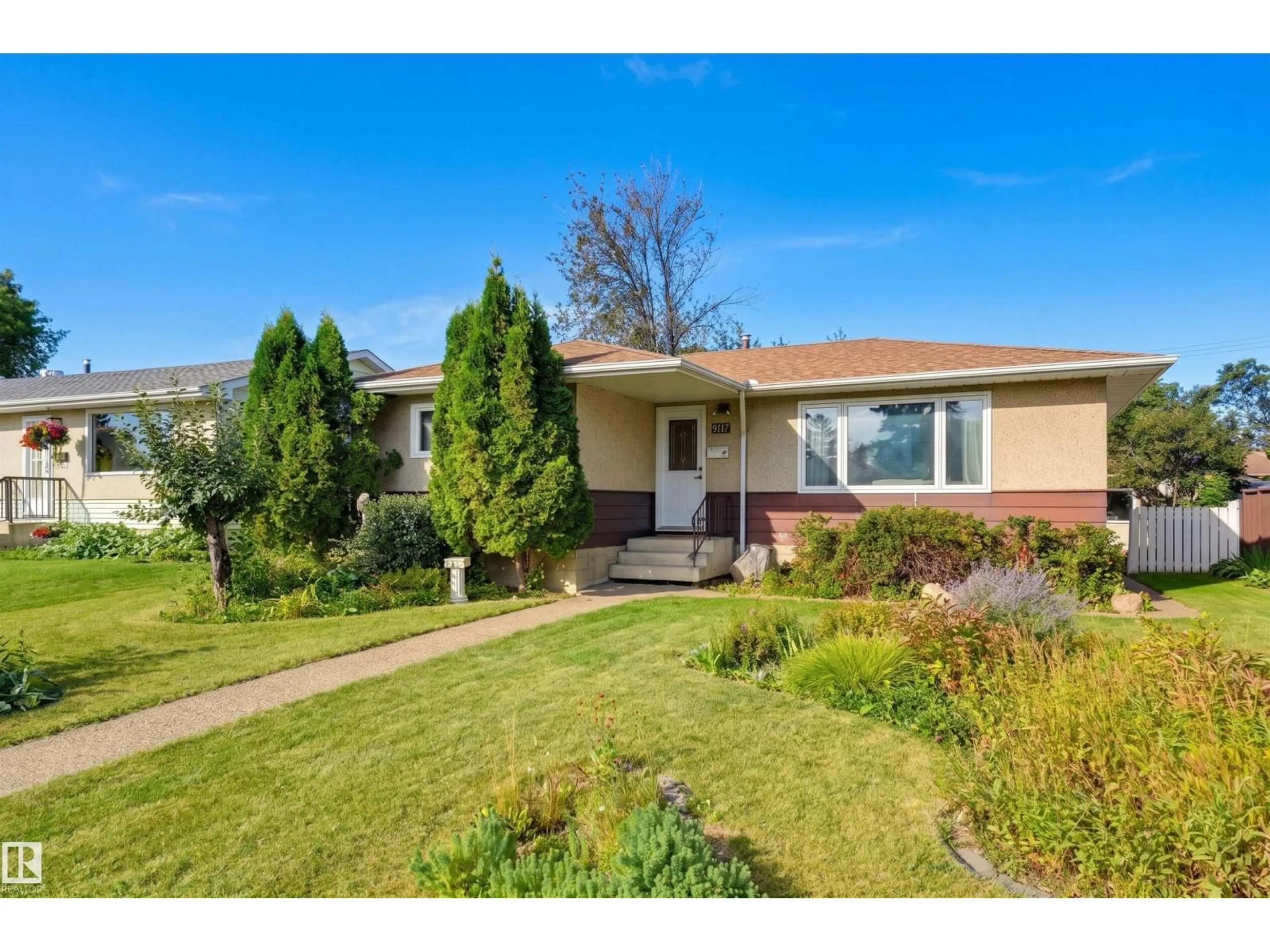 Home with vinyl exterior material, street for NW - 9122 167 ST, Edmonton Alberta T5R2T9
