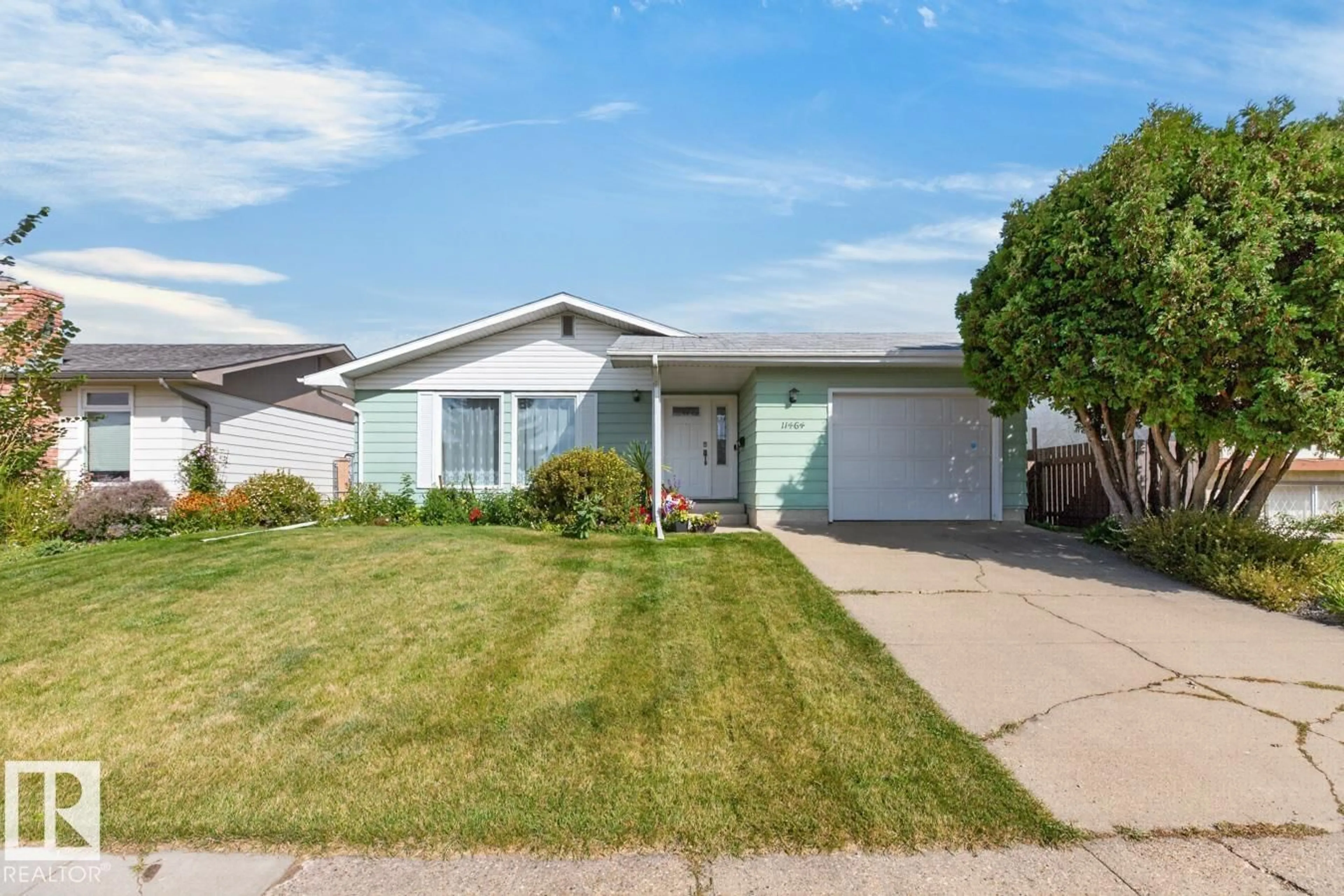 Home with vinyl exterior material, street for 11464 152A AV, Edmonton Alberta T5X1E2