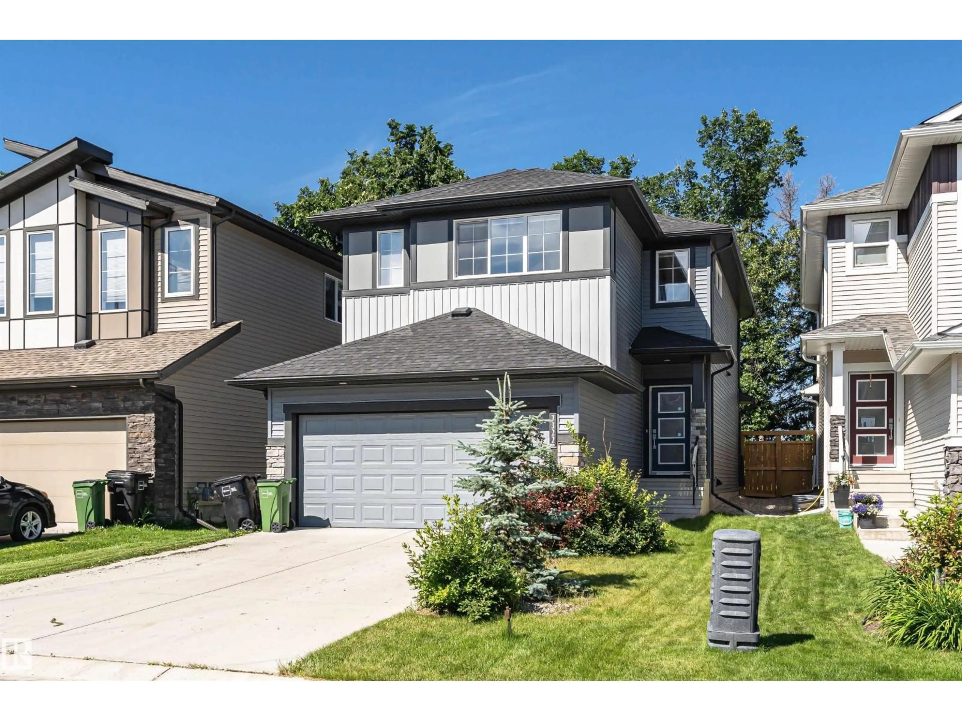 Home with brick exterior material, street for 7322 CHIVERS CR, Edmonton Alberta T6W4M1
