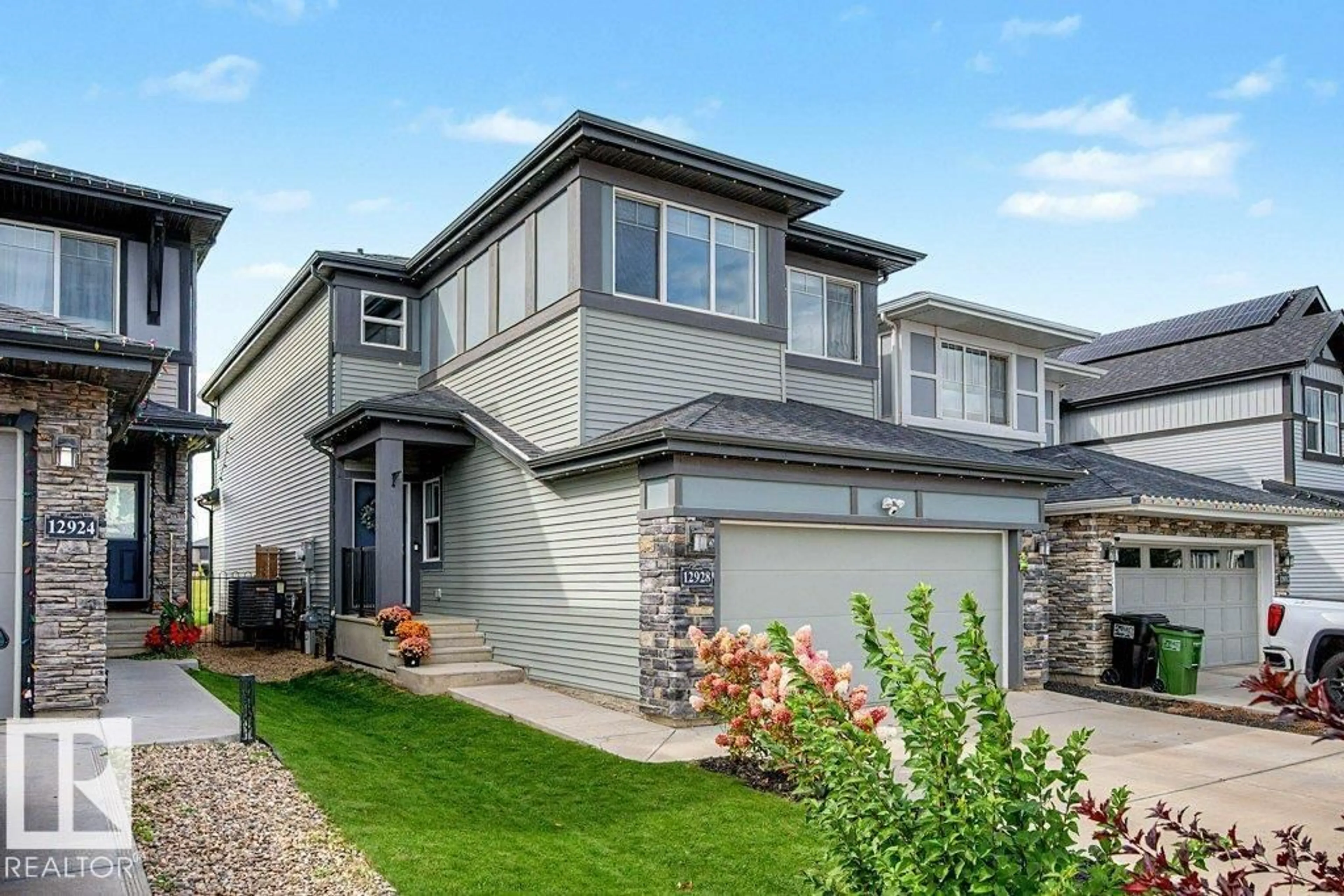 Home with vinyl exterior material, street for NW - 12928 211 ST, Edmonton Alberta T5S0N6
