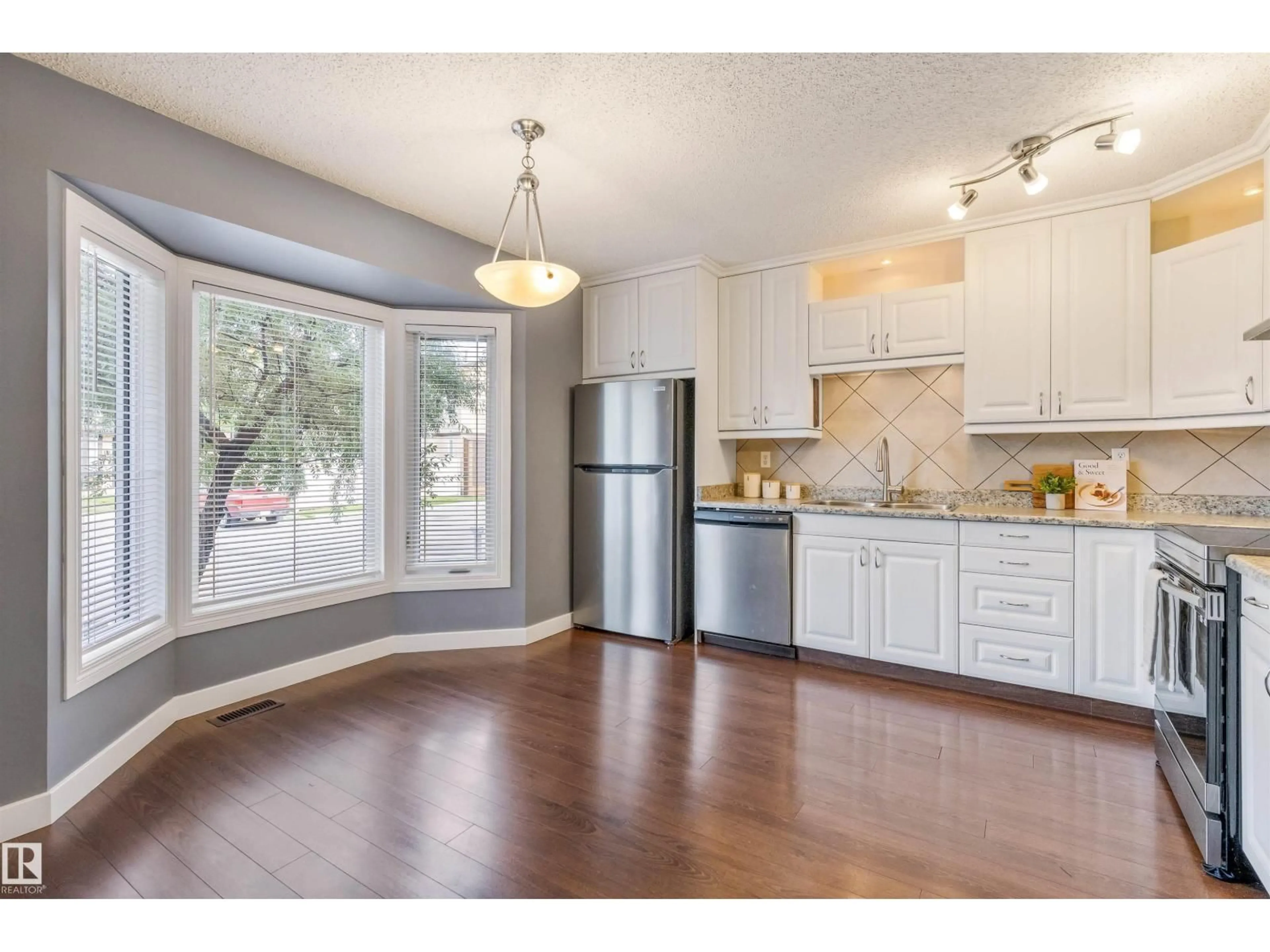 Open concept kitchen, unknown for #44 - 10205 158 AV NW, Edmonton Alberta T5X5E5