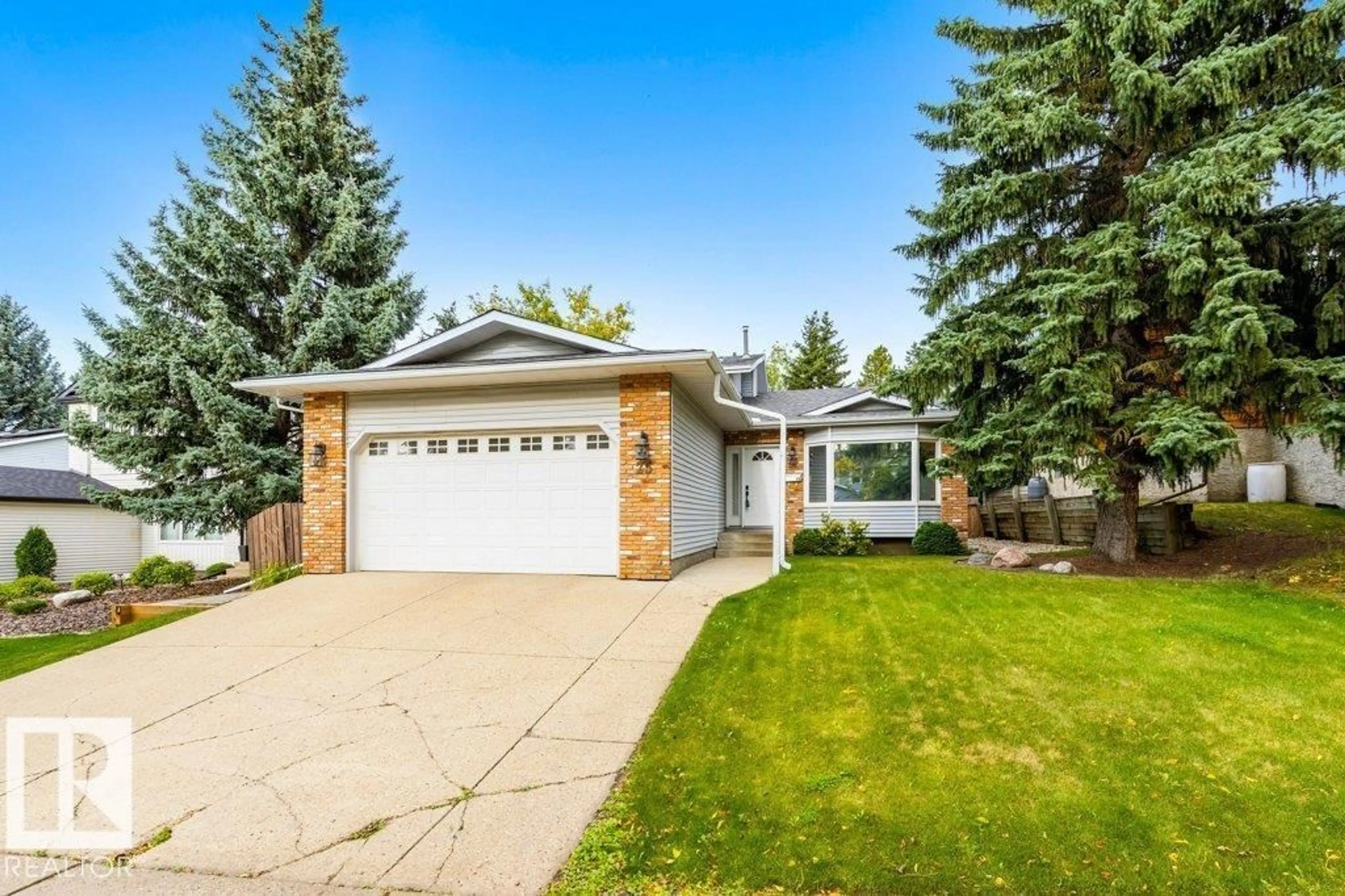 Home with vinyl exterior material, street for 25 WELLAND CR, St. Albert Alberta T8N3W3