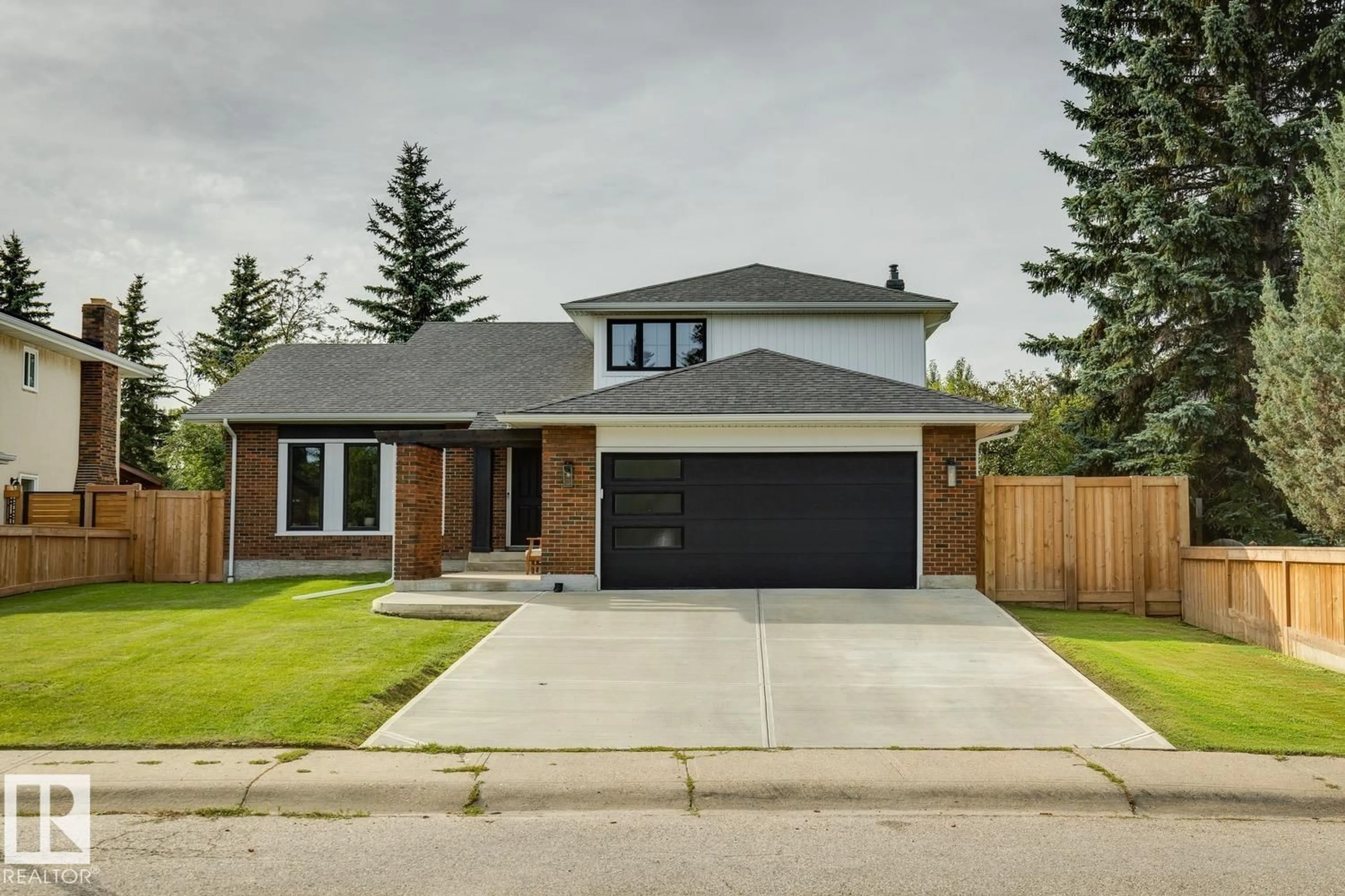 Home with brick exterior material, street for 11129 34A AV, Edmonton Alberta T6J3M2
