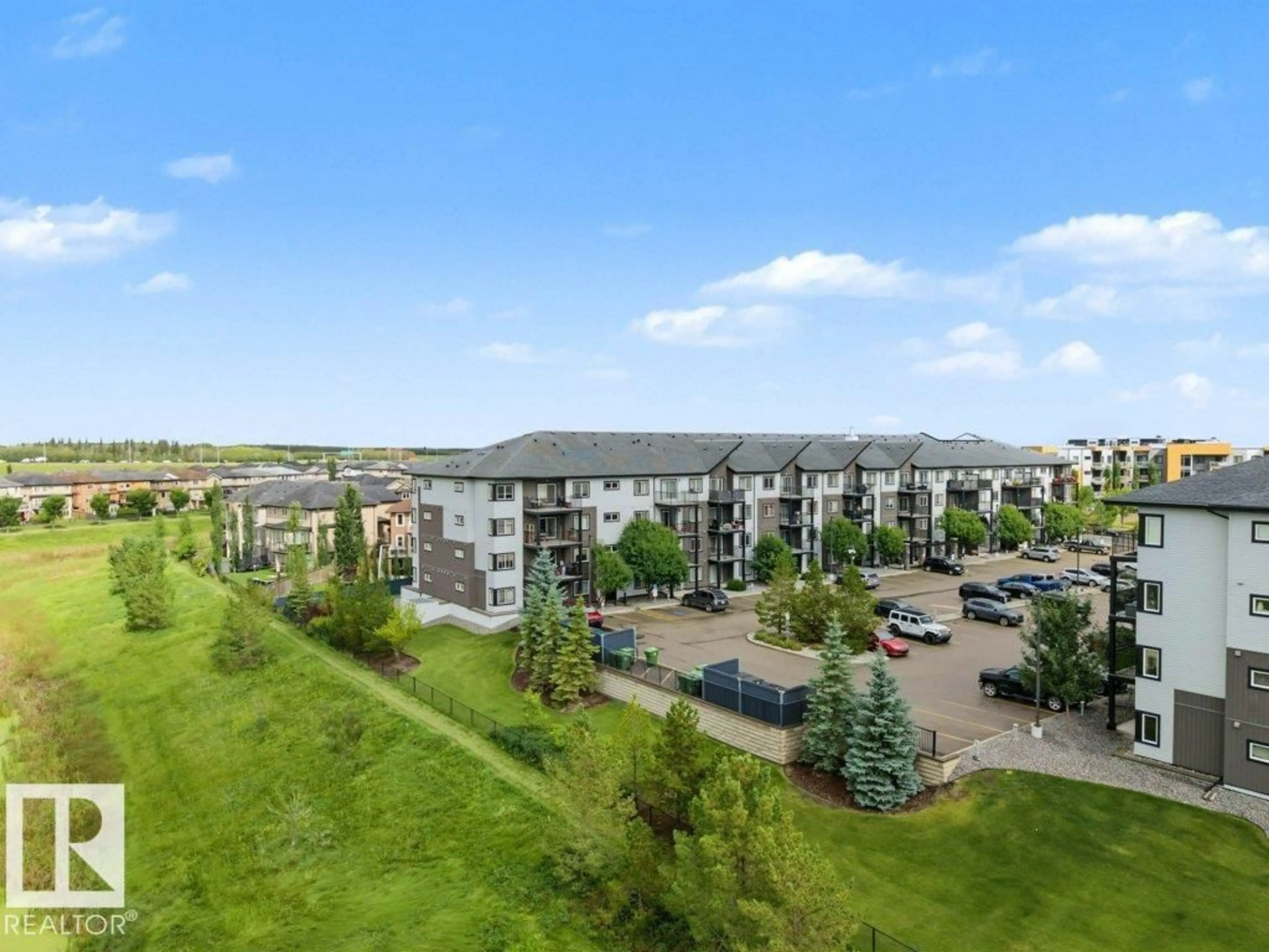 A pic from outside/outdoor area/front of a property/back of a property/a pic from drone, mountain view for #311 - 508 ALBANY WY, Edmonton Alberta T6V0H9