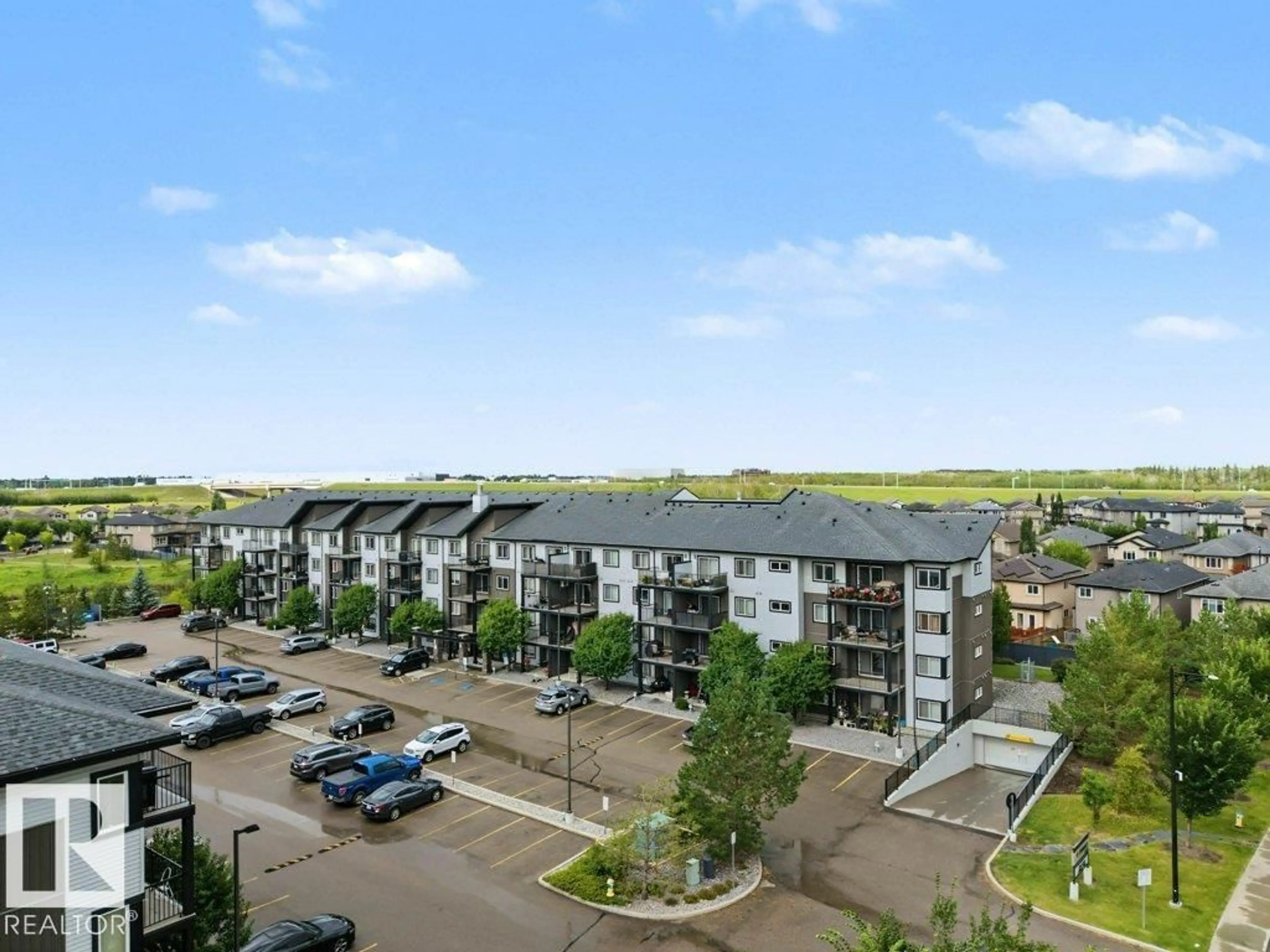 A pic from outside/outdoor area/front of a property/back of a property/a pic from drone, city buildings view from balcony for #311 - 508 ALBANY WY, Edmonton Alberta T6V0H9