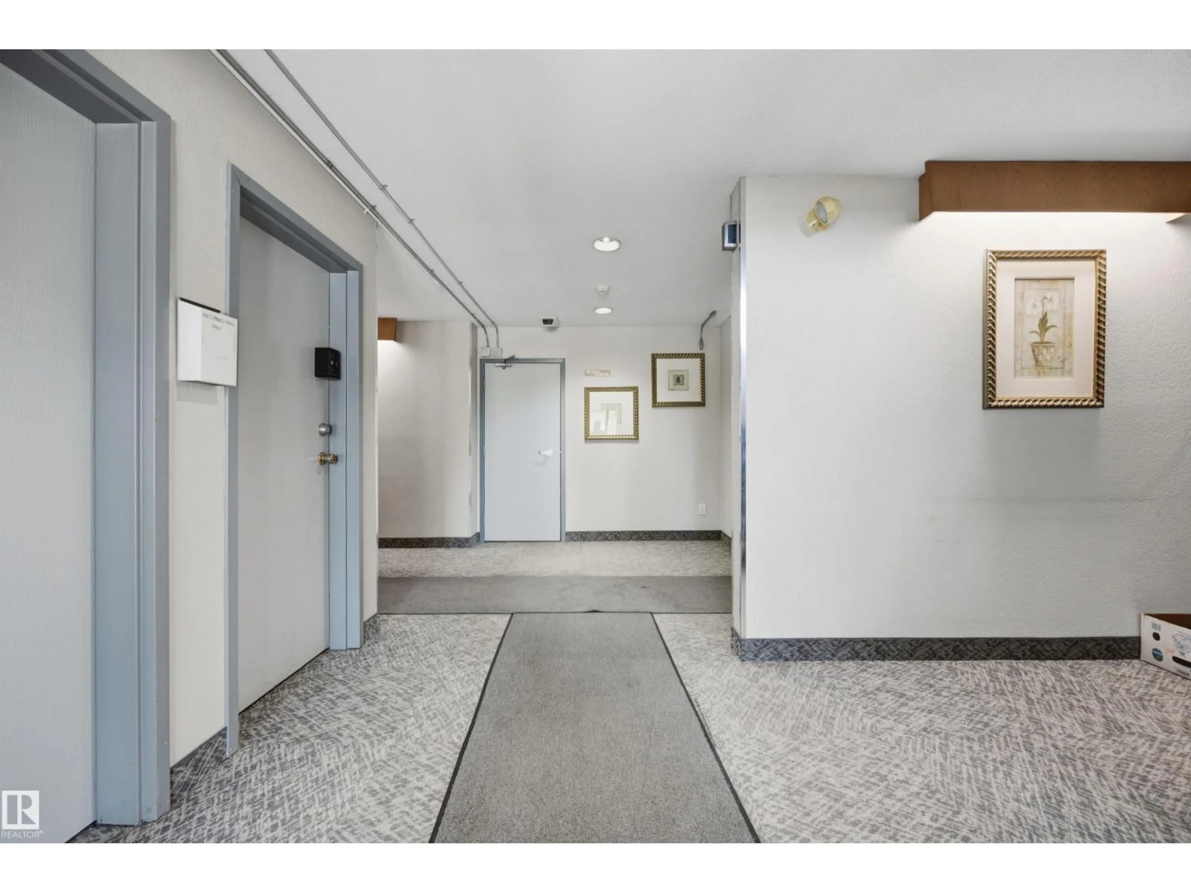 Indoor foyer for #119 - 3611 145 AV, Edmonton Alberta T5Y2L7