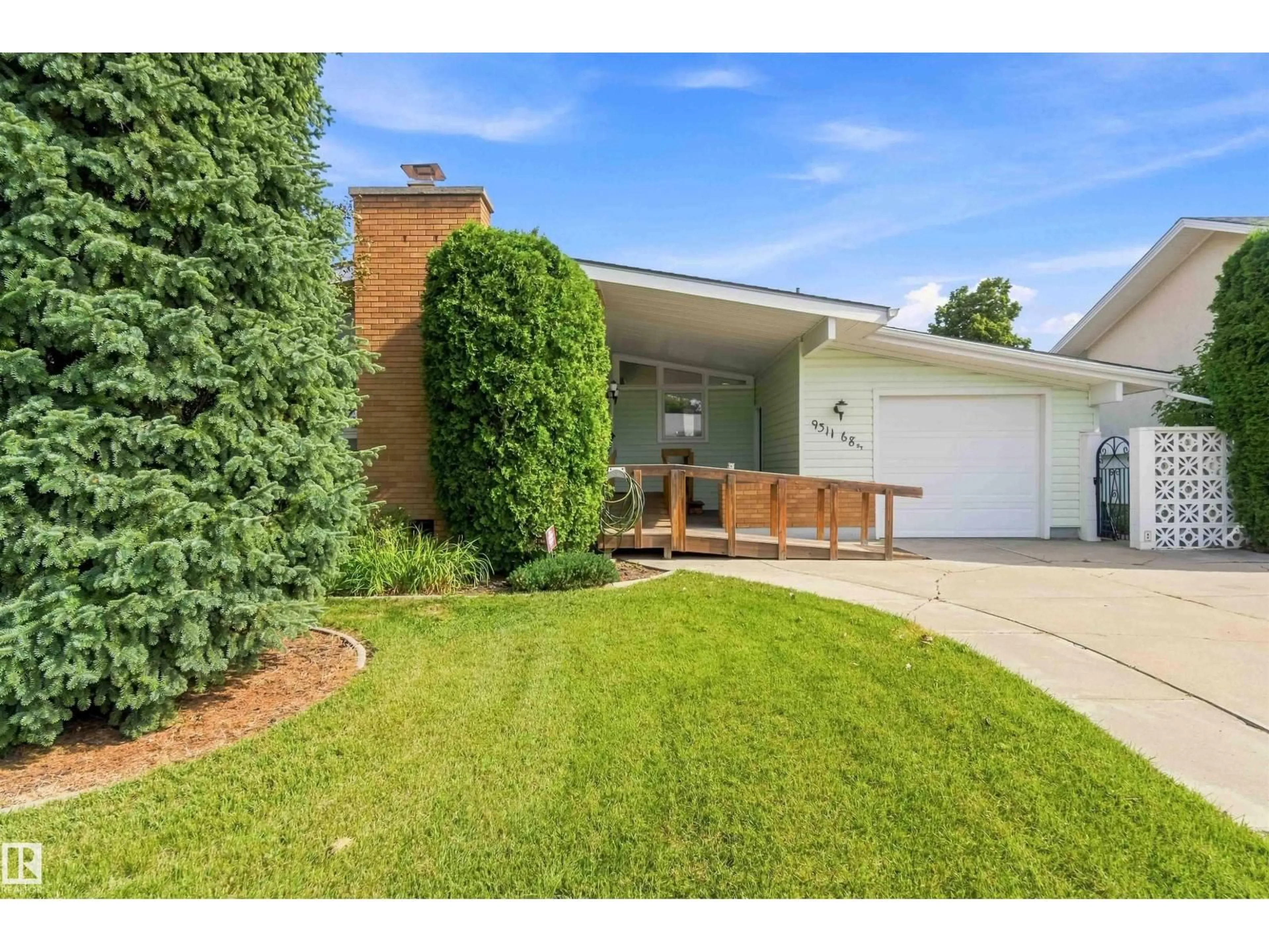 Home with brick exterior material, street for 9311 68 ST, Edmonton Alberta T6B1S9
