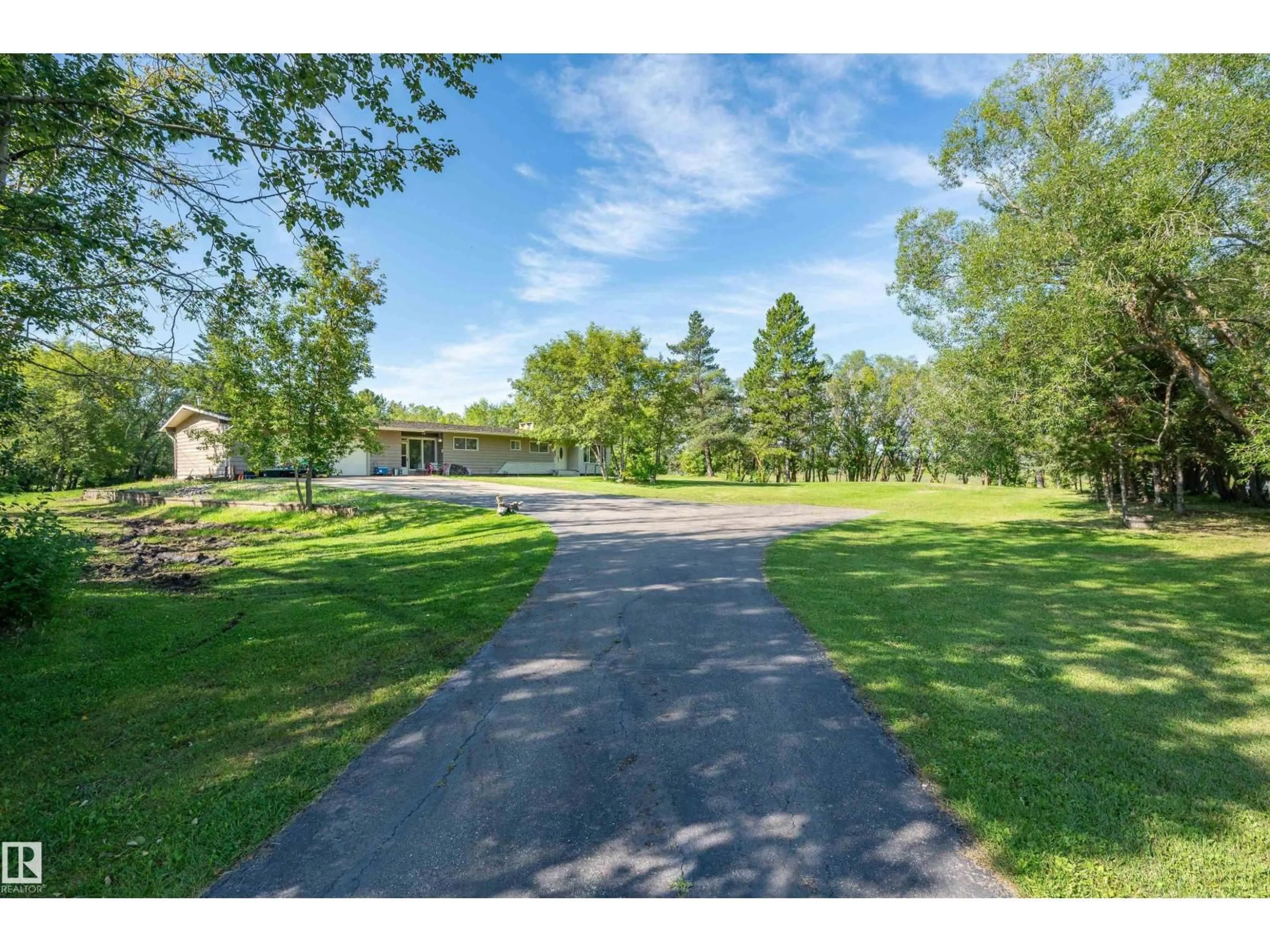 A pic from outside/outdoor area/front of a property/back of a property/a pic from drone, water/lake/river/ocean view for 109 - 52312 RGE ROAD 223, Rural Strathcona County Alberta T8C1B3