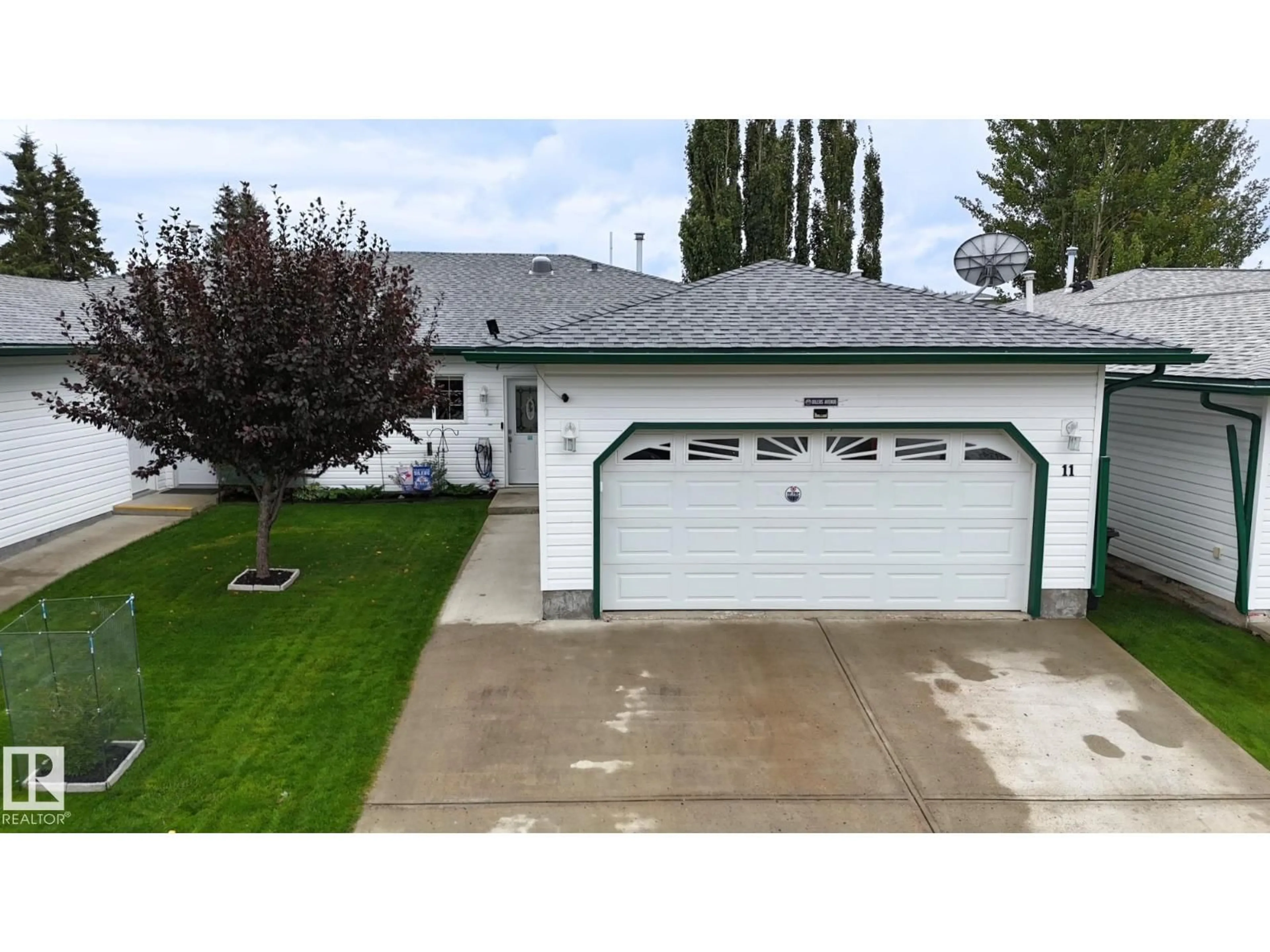 Home with vinyl exterior material, street for 11 4651 MADSEN AV, Drayton Valley Alberta T7A1V6