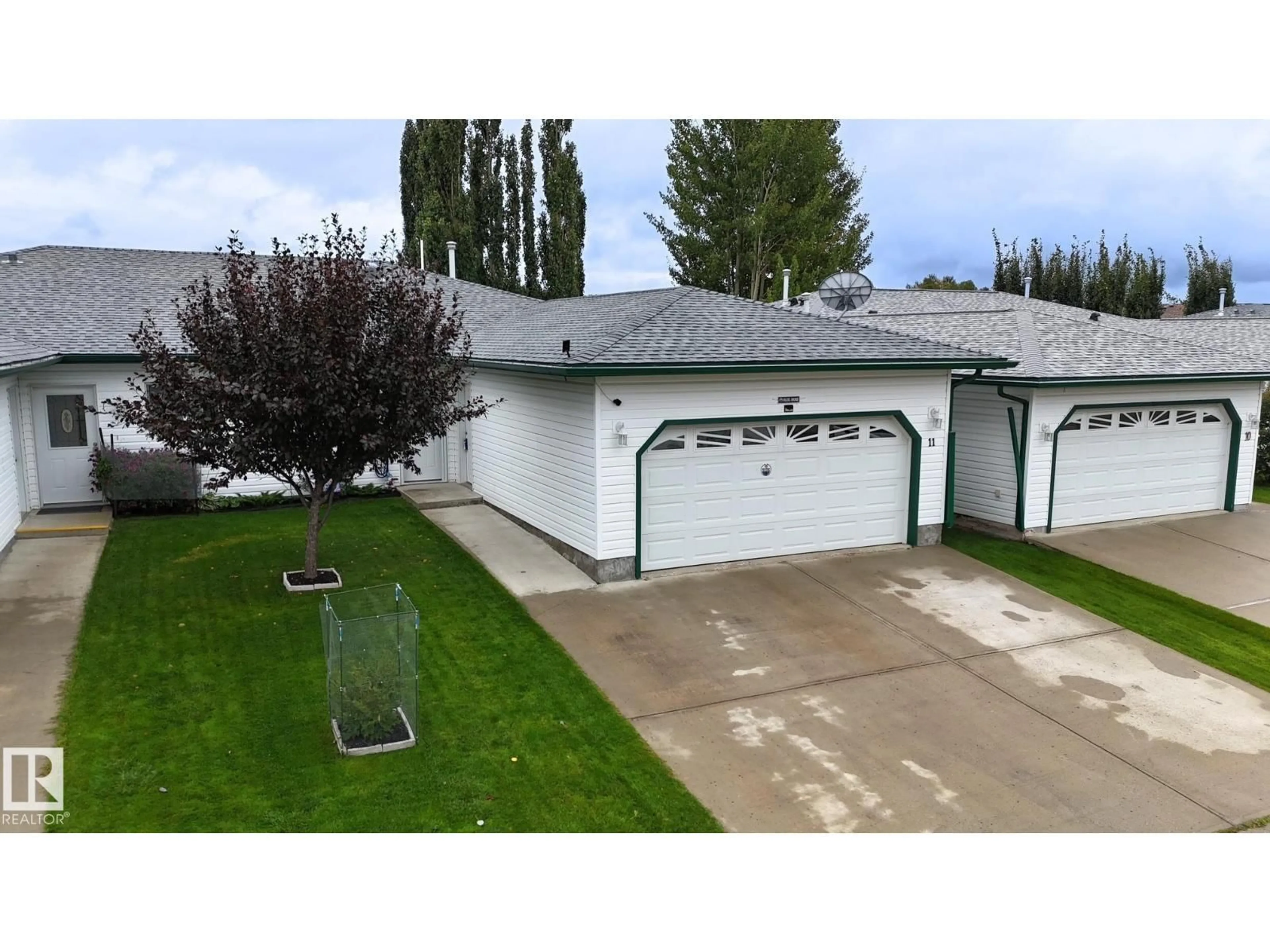 A pic from outside/outdoor area/front of a property/back of a property/a pic from drone, street for 11 4651 MADSEN AV, Drayton Valley Alberta T7A1V6