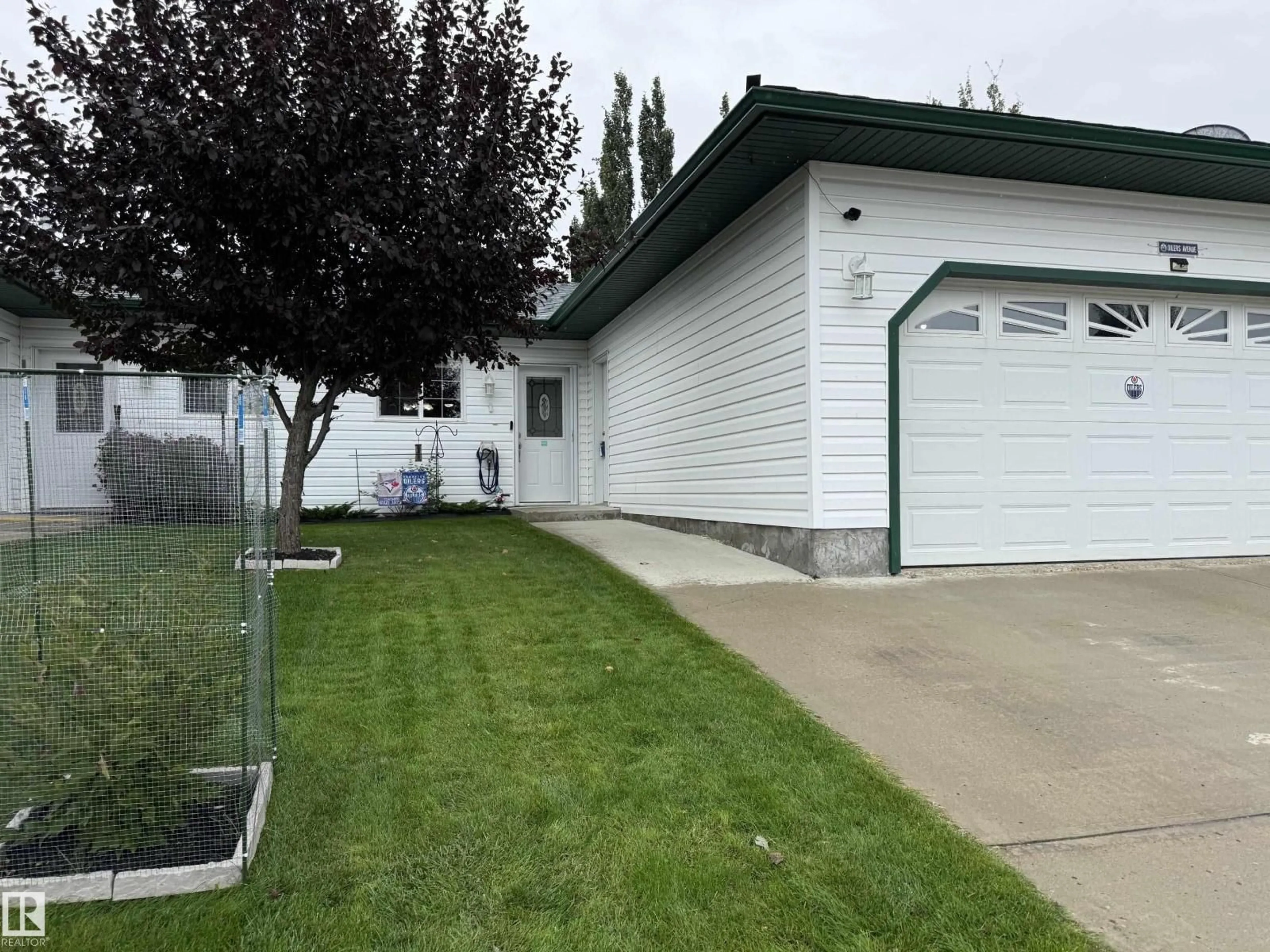 Home with vinyl exterior material, street for 11 4651 MADSEN AV, Drayton Valley Alberta T7A1V6