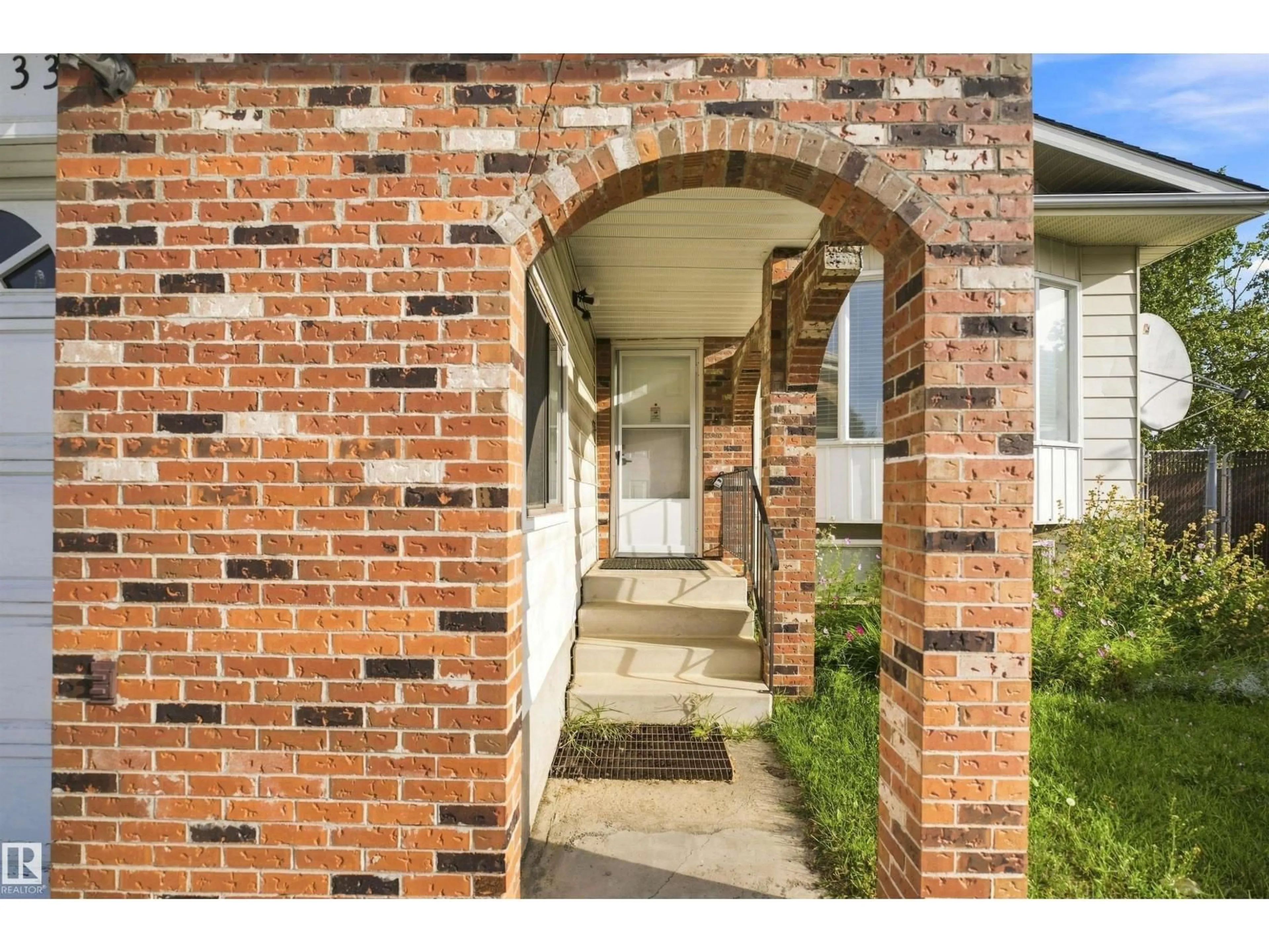 Home with brick exterior material, street for 3508 33 AV, Edmonton Alberta T6L5G6