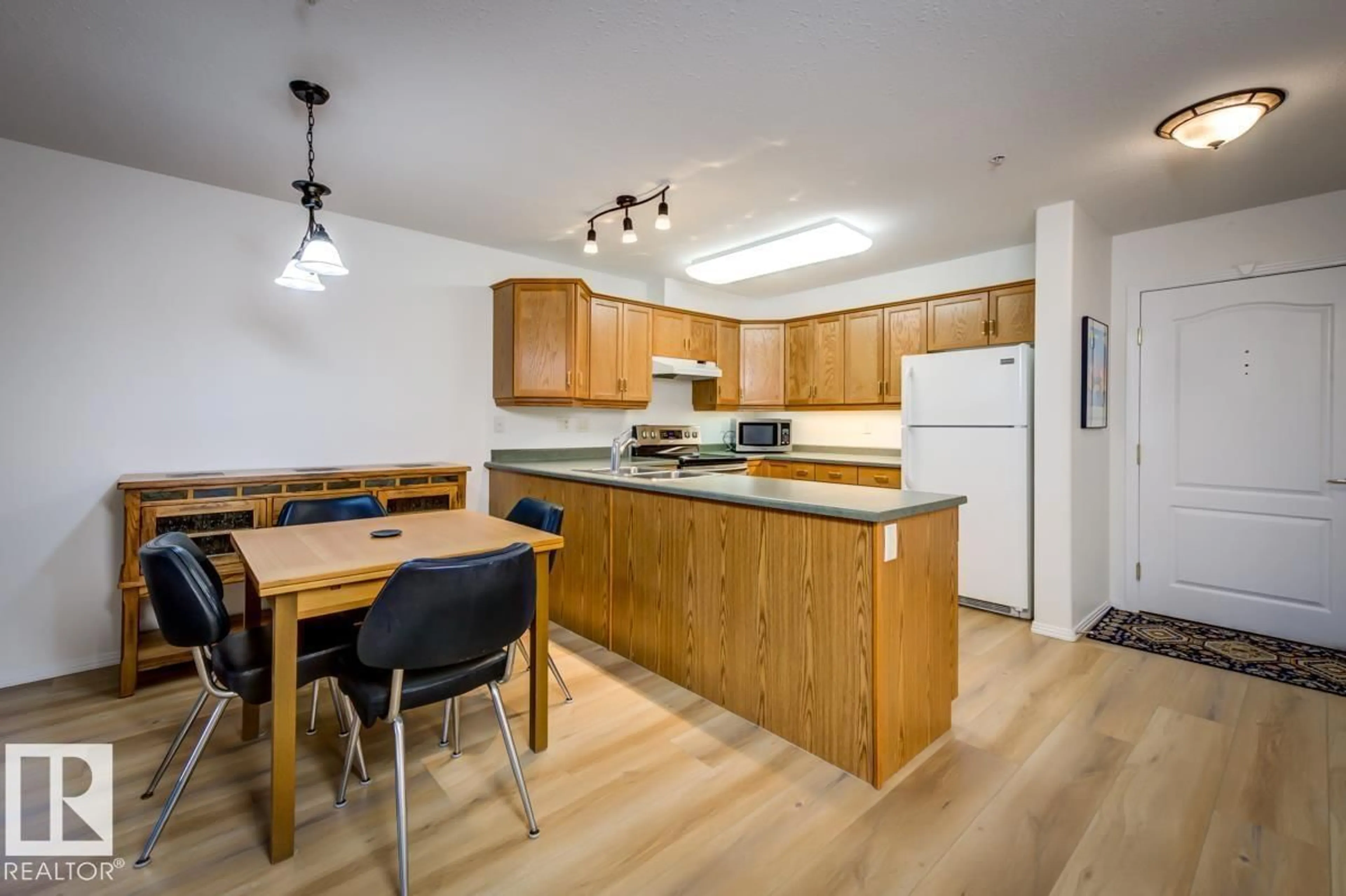 Standard kitchen, wood/laminate floor for #212 - 8912 156 ST, Edmonton Alberta T5R5Z2