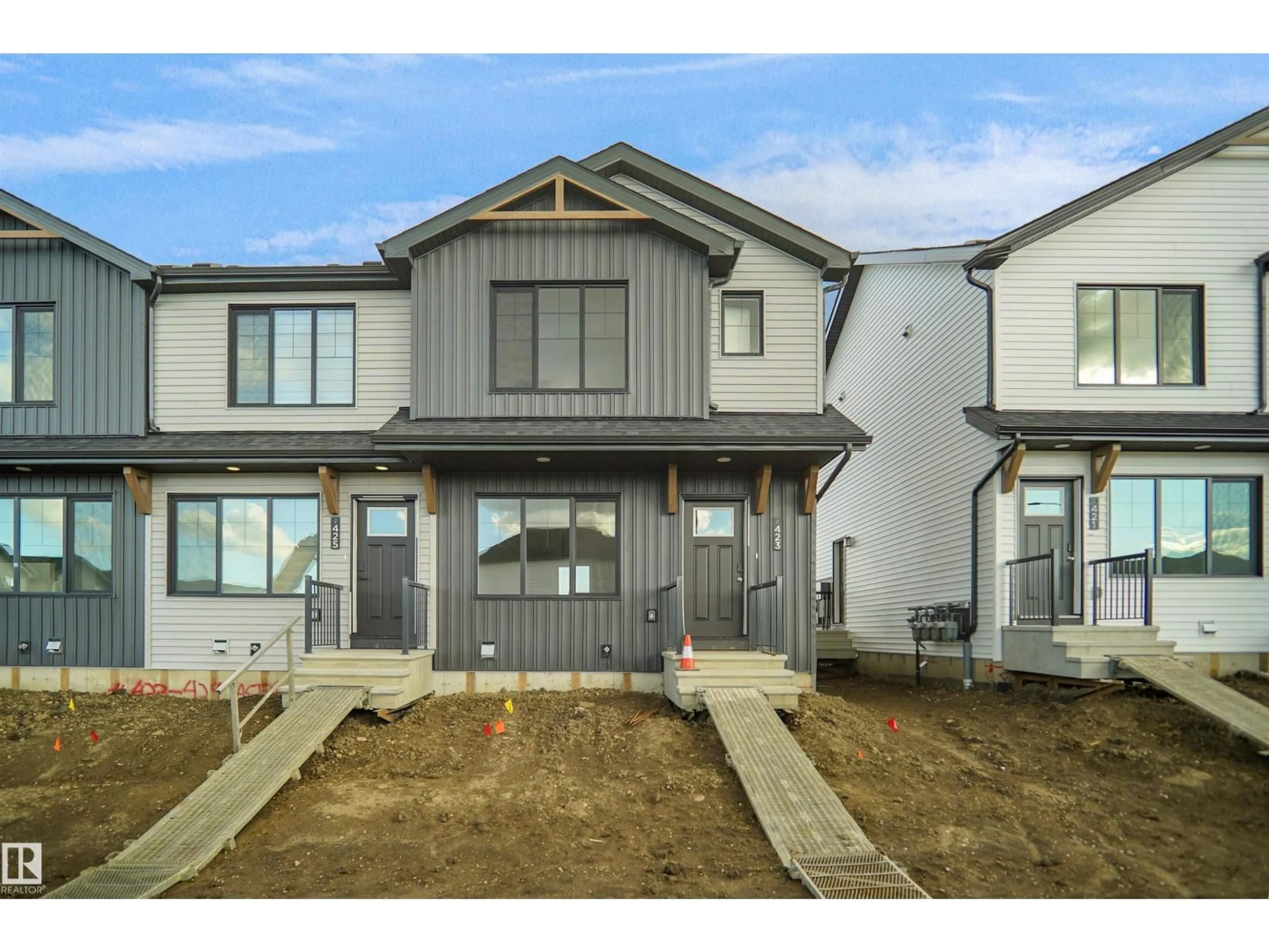 Home with vinyl exterior material, street for 423 ASTER DR, Edmonton Alberta T6T2N8