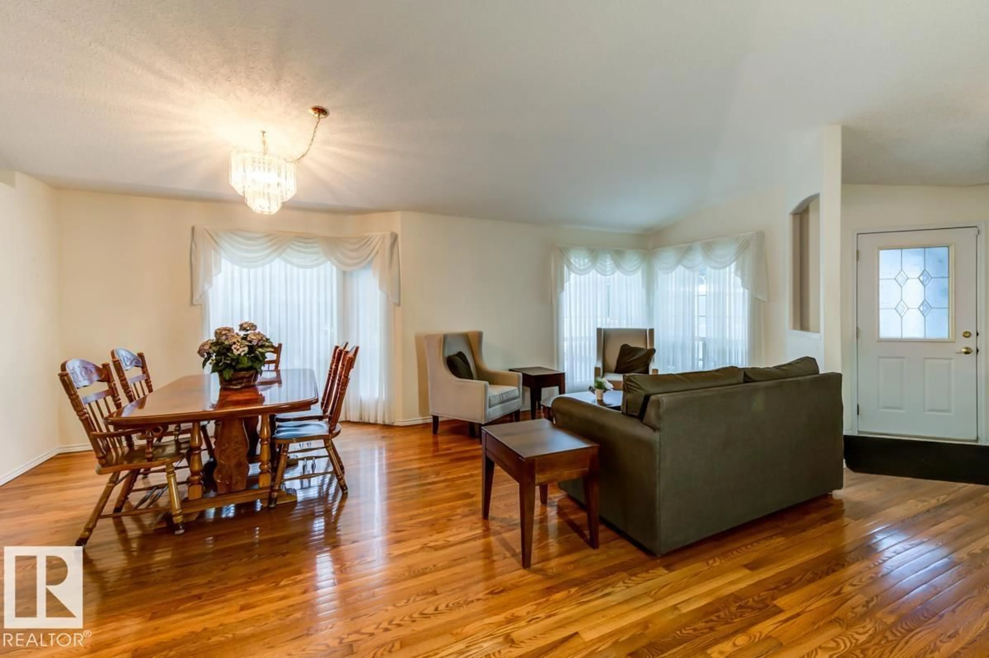 Living room with furniture, wood/laminate floor for 7 - 9731 174 ST NW, Edmonton Alberta T5T6G4