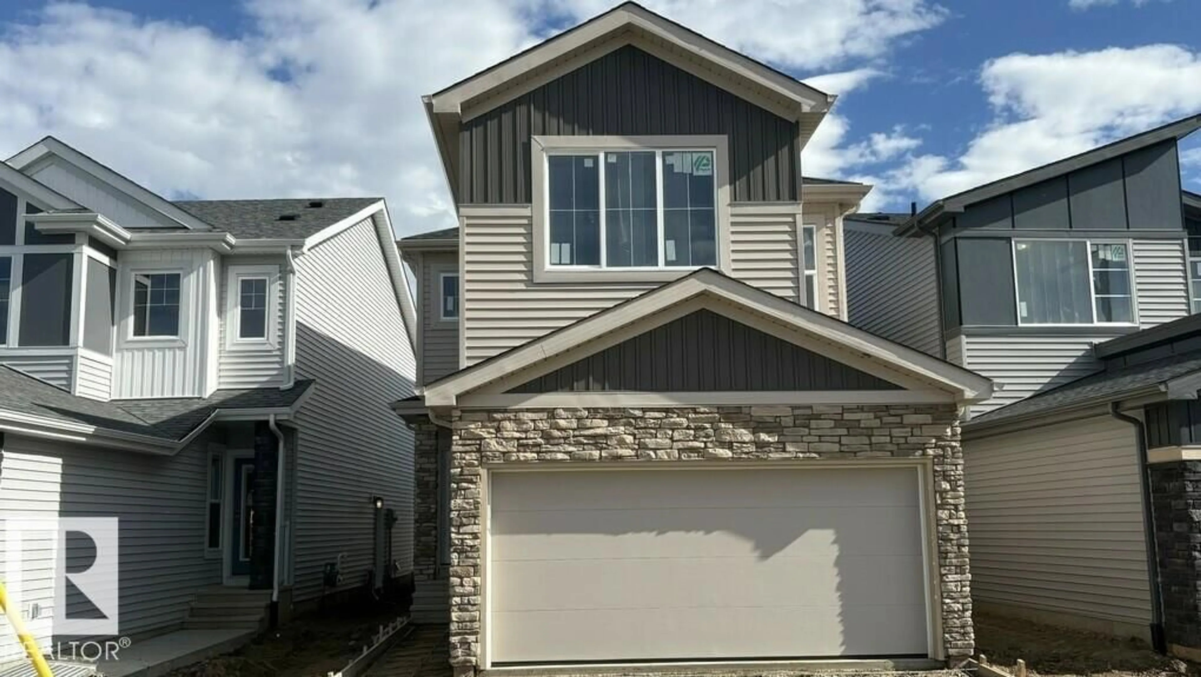 Home with vinyl exterior material, street for 5834 RAVEN CR, Edmonton Alberta T5S0S7