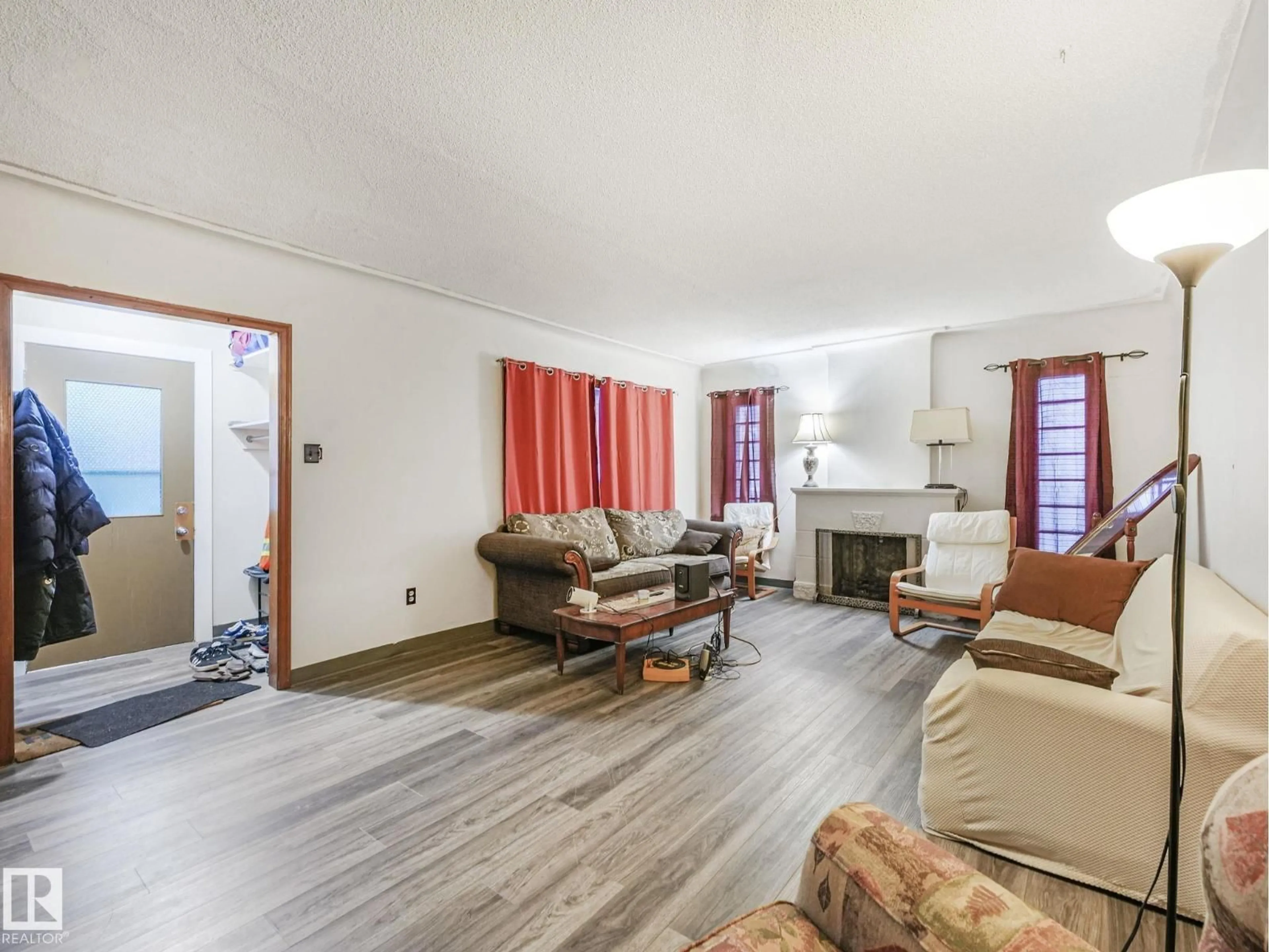 Living room with furniture, unknown for NW - 10948 108 ST, Edmonton Alberta T5H3A7