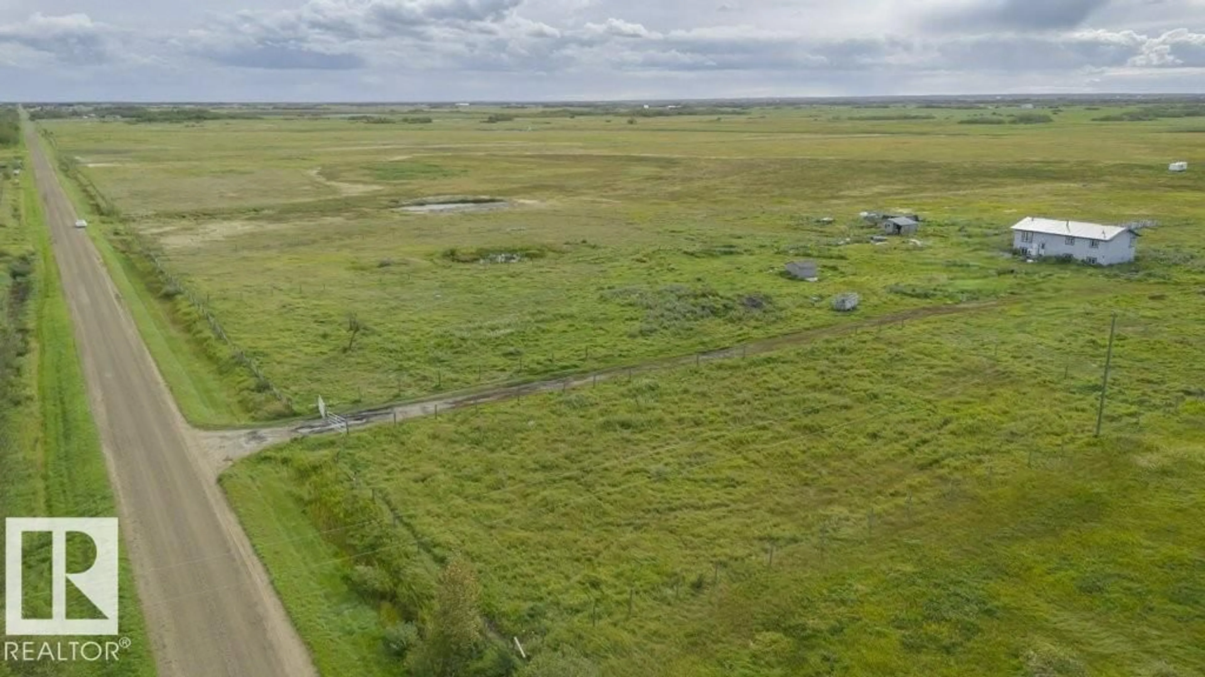 A pic from outside/outdoor area/front of a property/back of a property/a pic from drone, water/lake/river/ocean view for 535062 RGE RD 180, Rural Lamont County Alberta T0B2R0