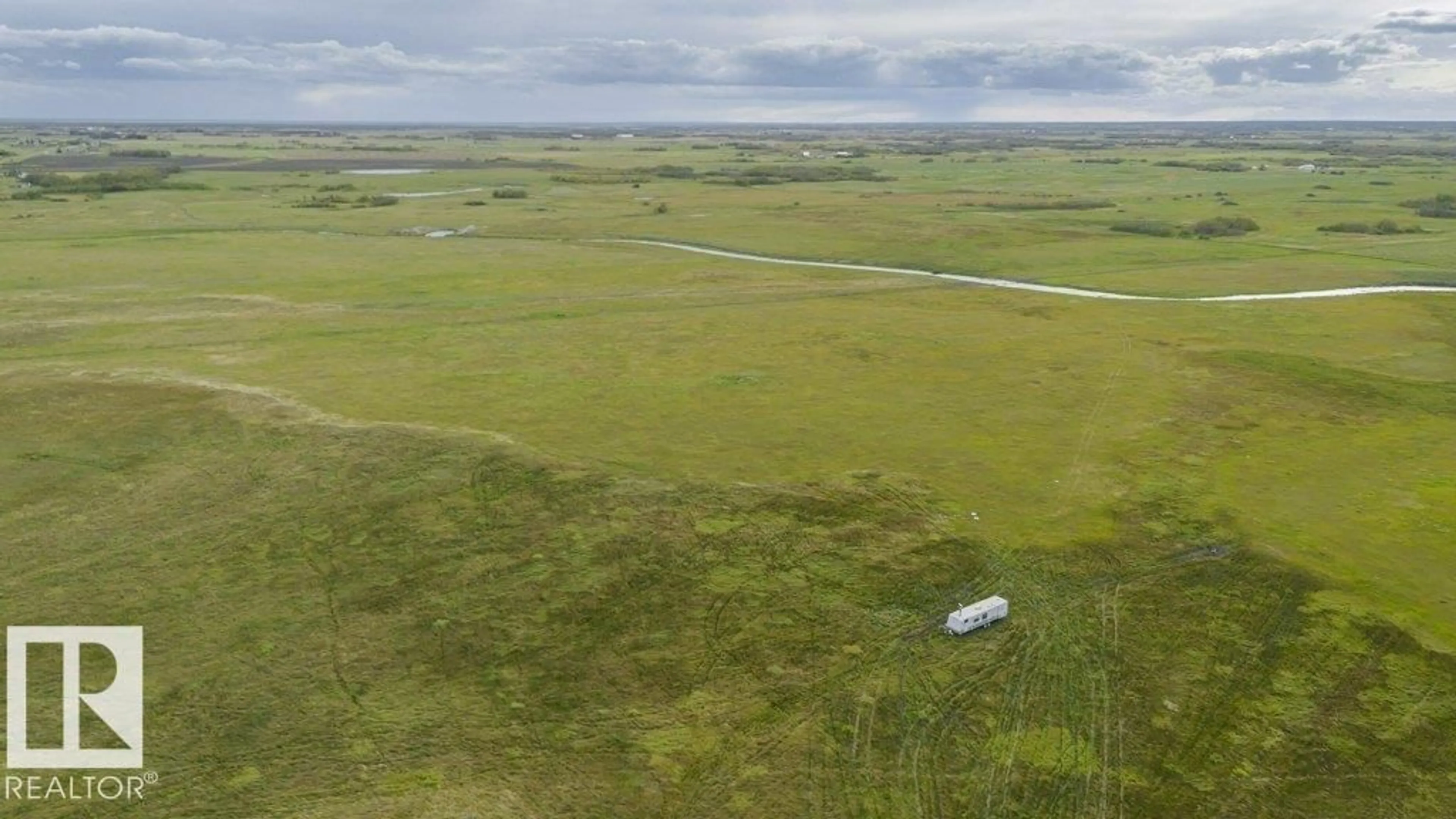 A pic from outside/outdoor area/front of a property/back of a property/a pic from drone, unknown for 535062 RGE RD 180, Rural Lamont County Alberta T0B2R0