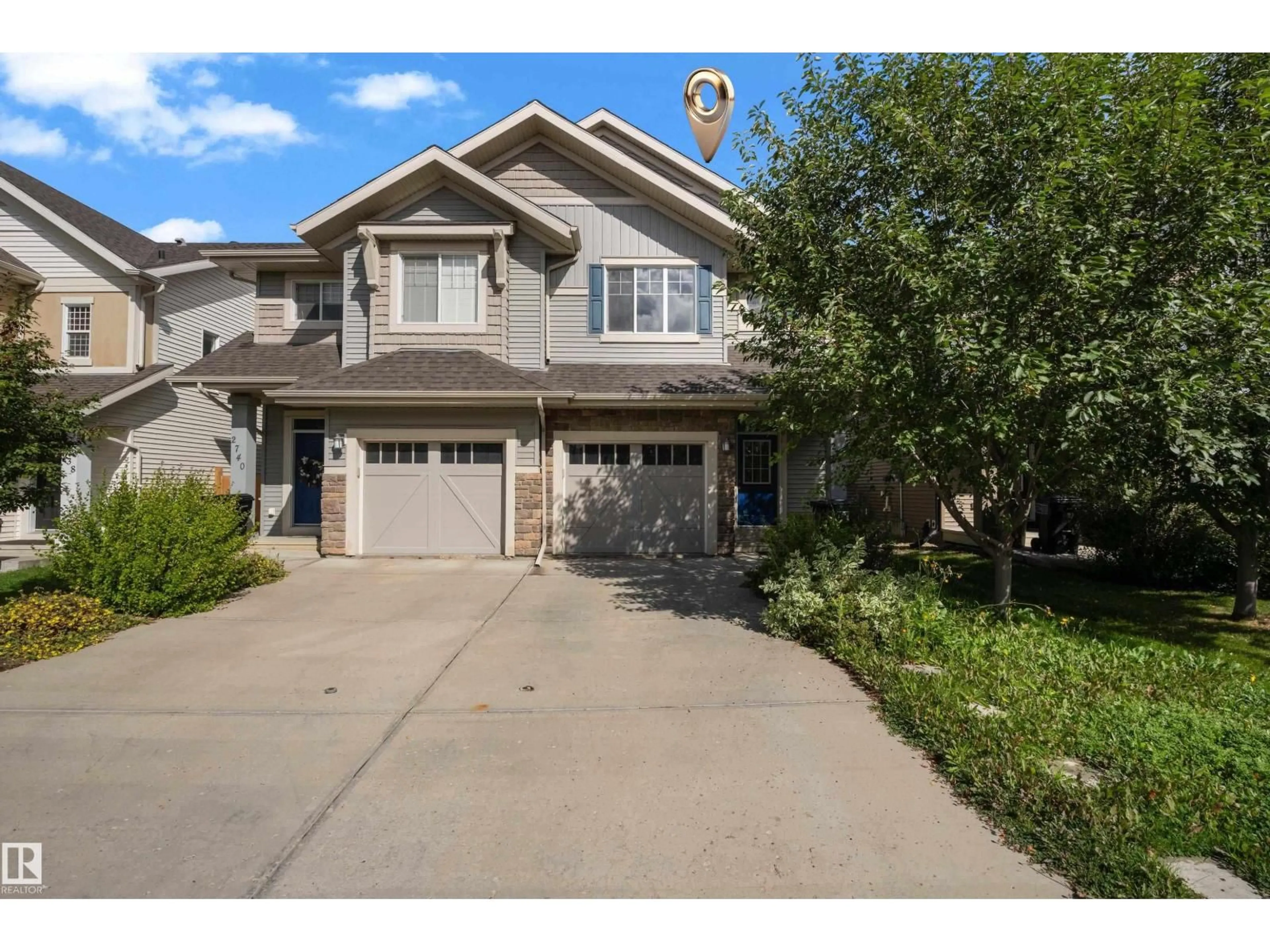 Home with vinyl exterior material, street for GR SW SW - 2742 COUGHLAN GREEN, Edmonton Alberta T6W3N8